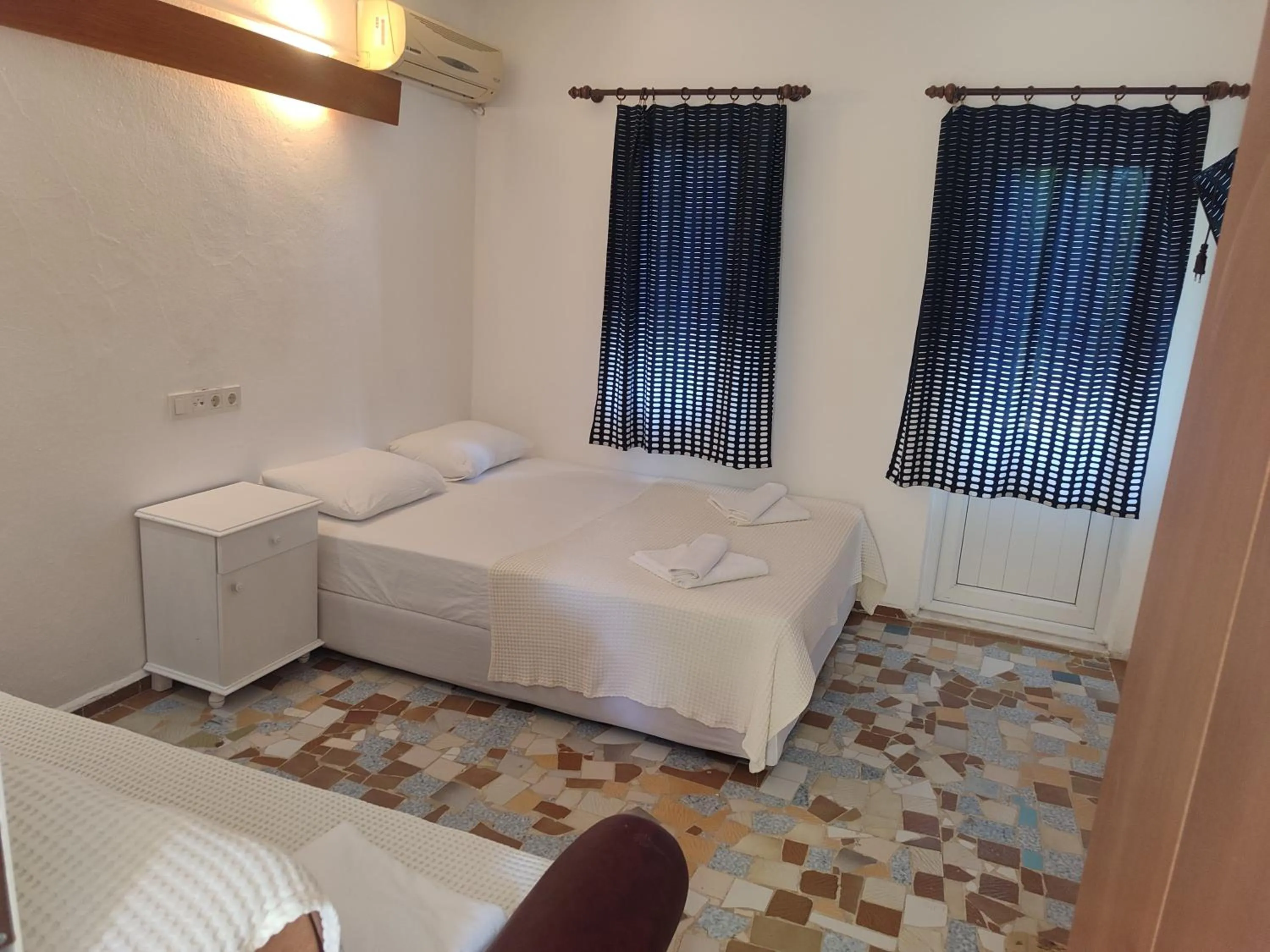 Bed in Hotel Tropicana