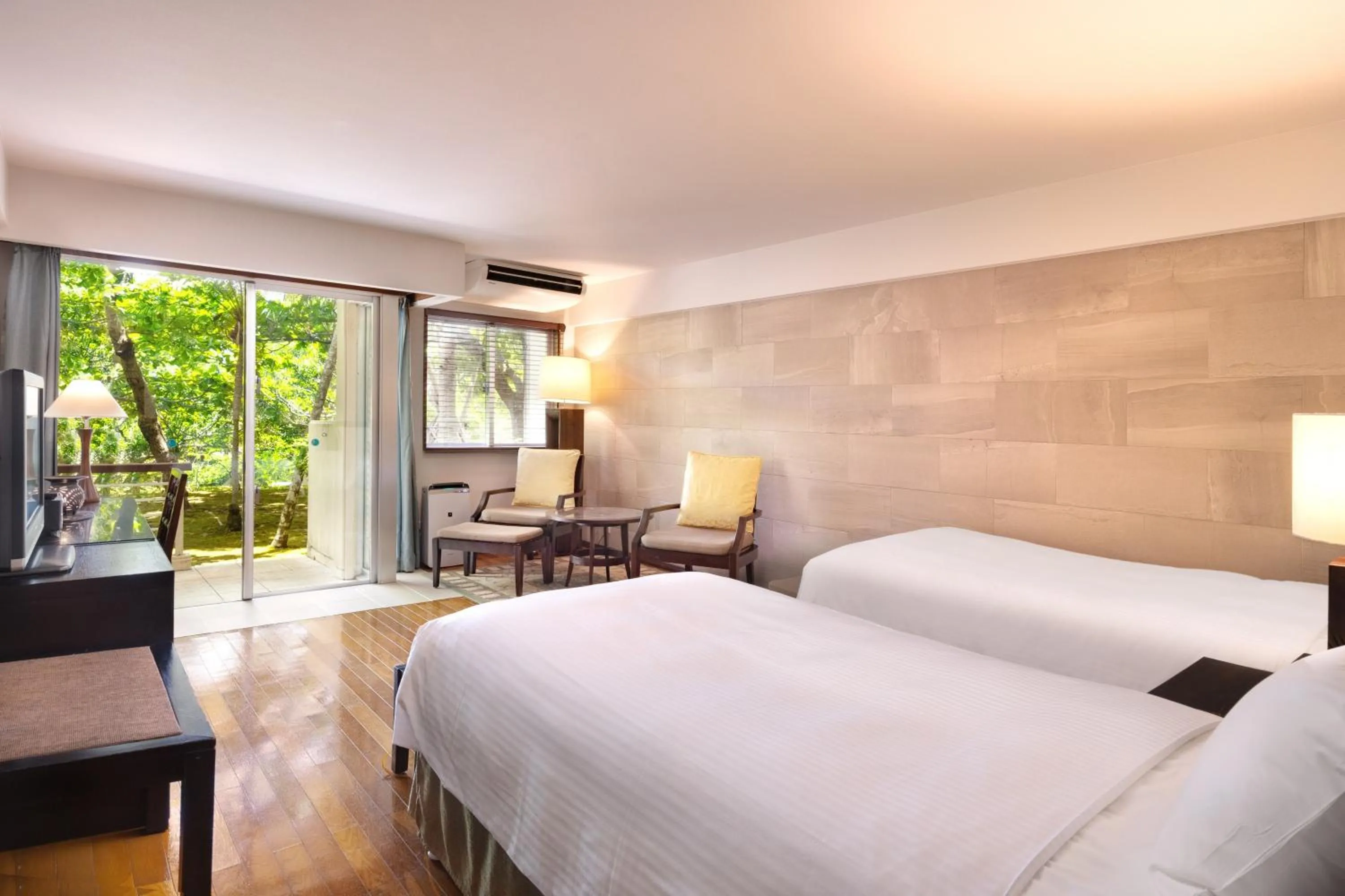 Bed in Coco Garden Resort Okinawa