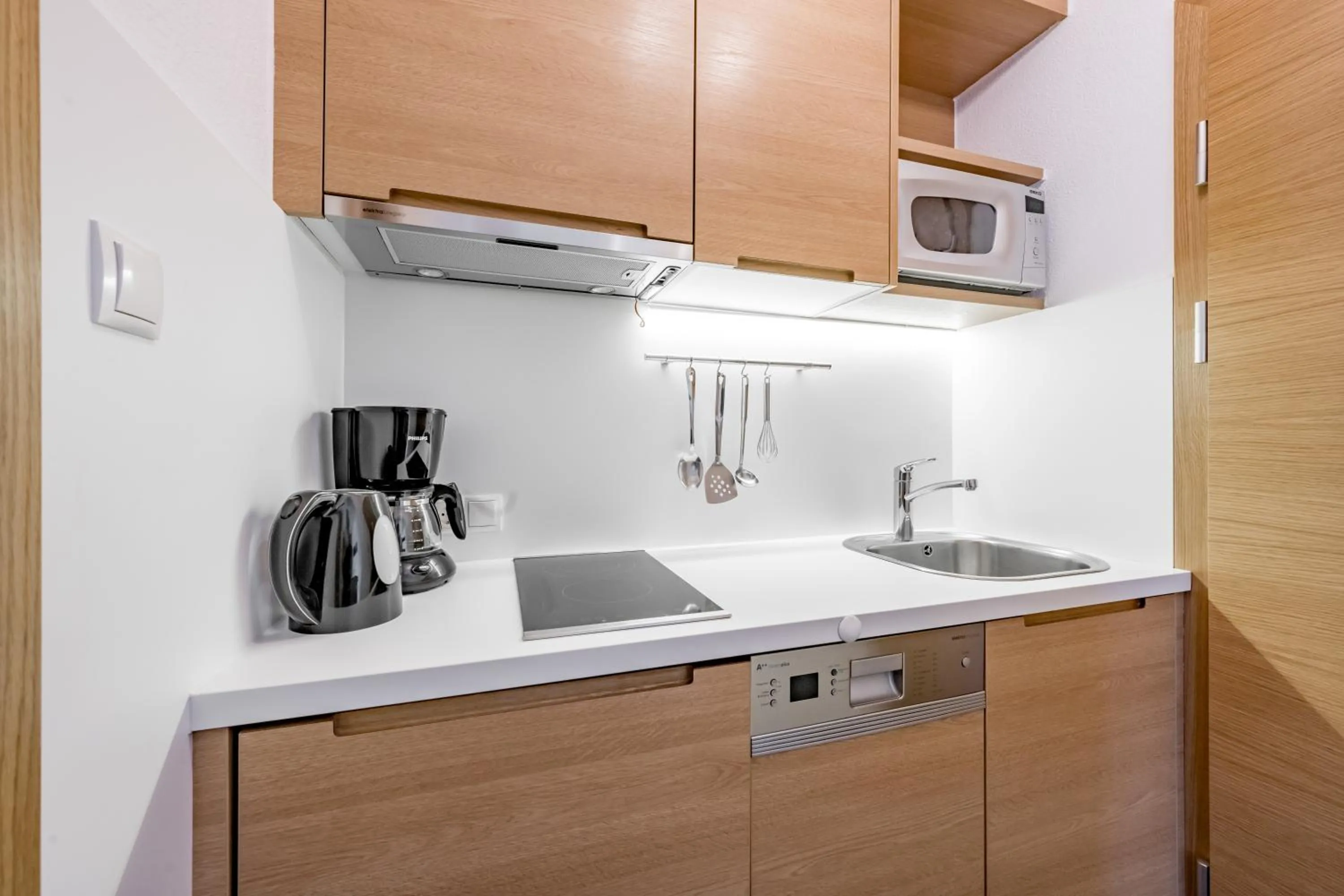 Kitchen or kitchenette in Apart Hotel Garni Wieser