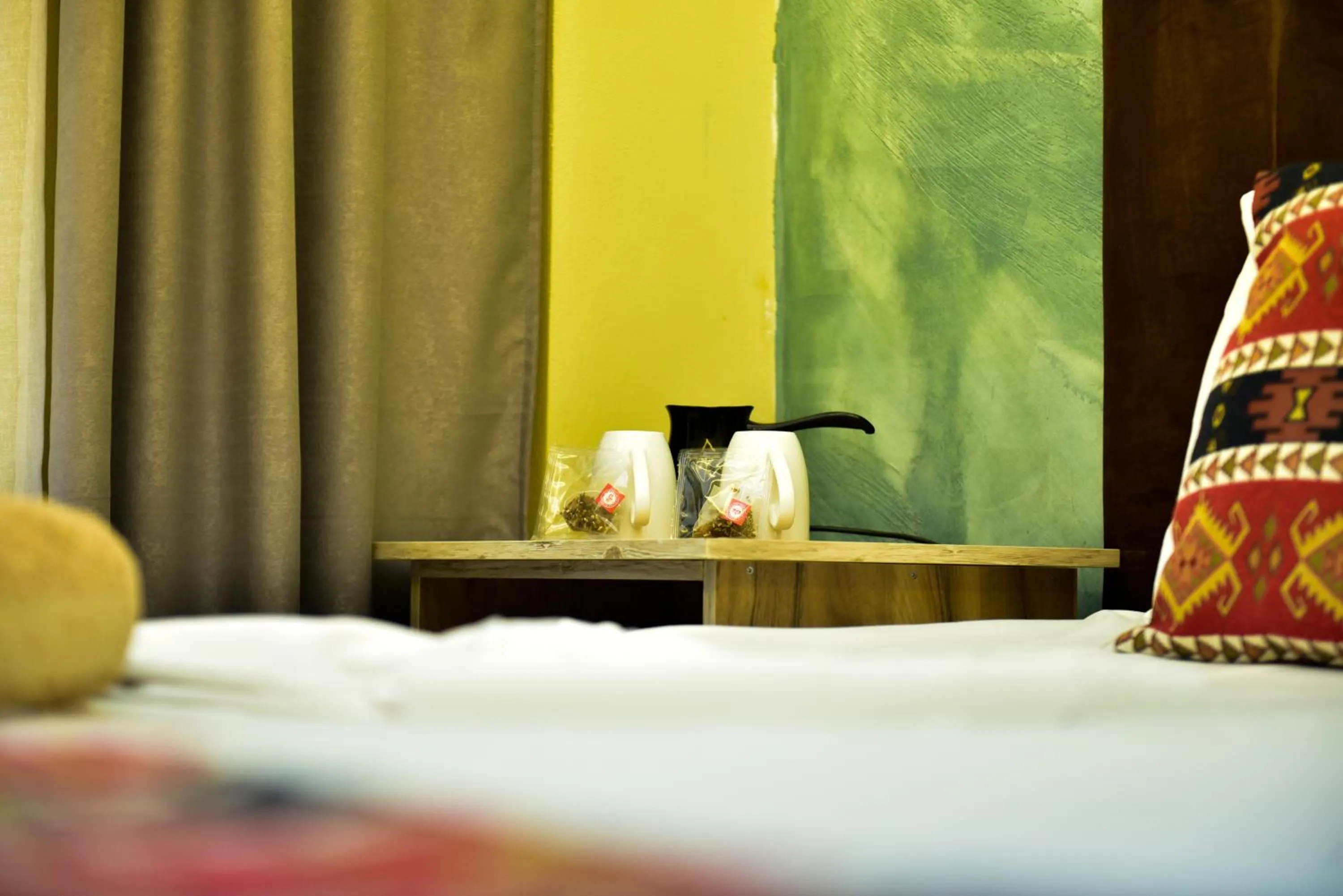 Bed in TE BUJTINA HOTEL- Cozy Stay with Traditional Breakfast Near Beach