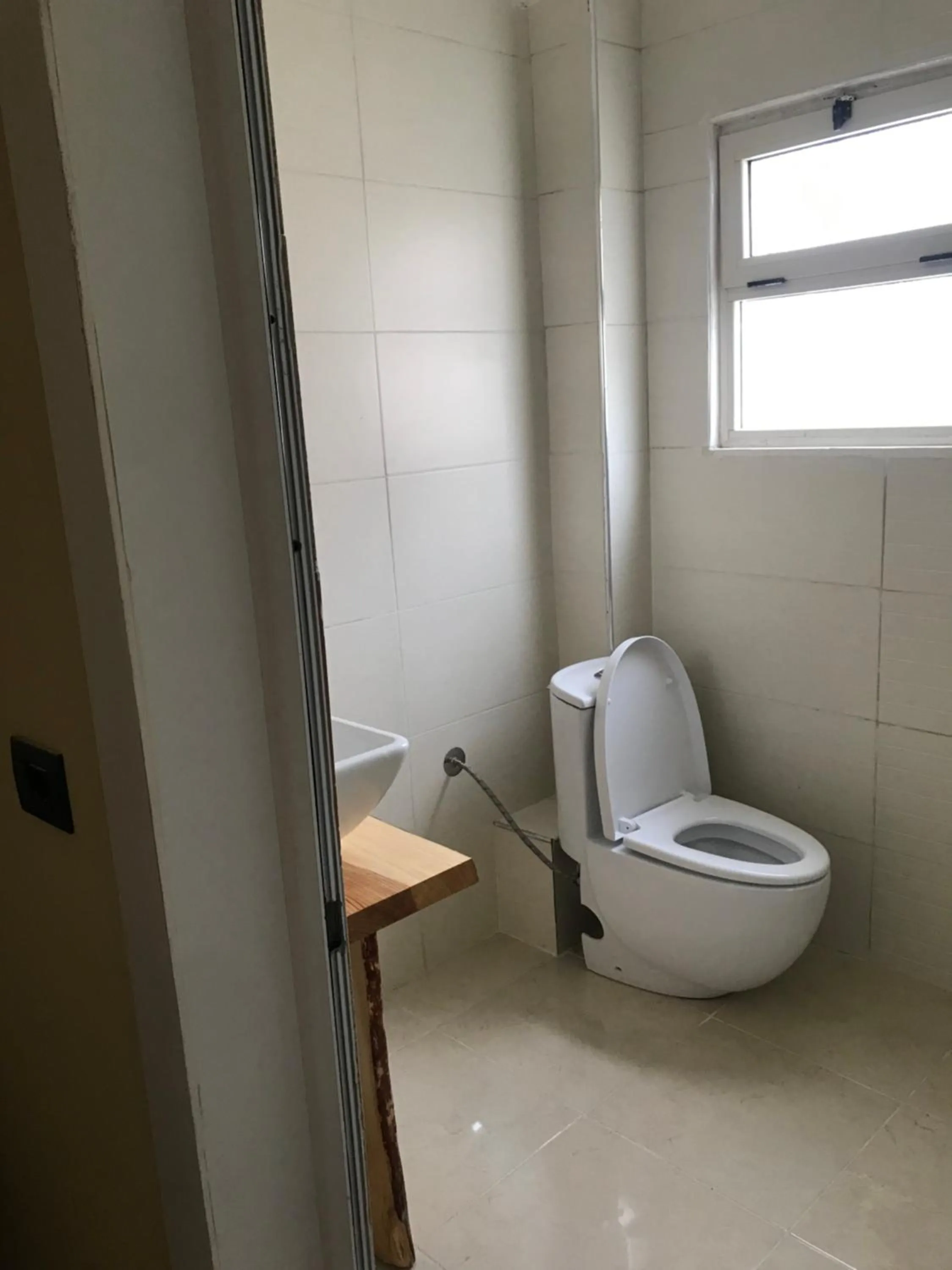 Toilet in TE BUJTINA HOTEL- Cozy Stay with Traditional Breakfast Near Beach