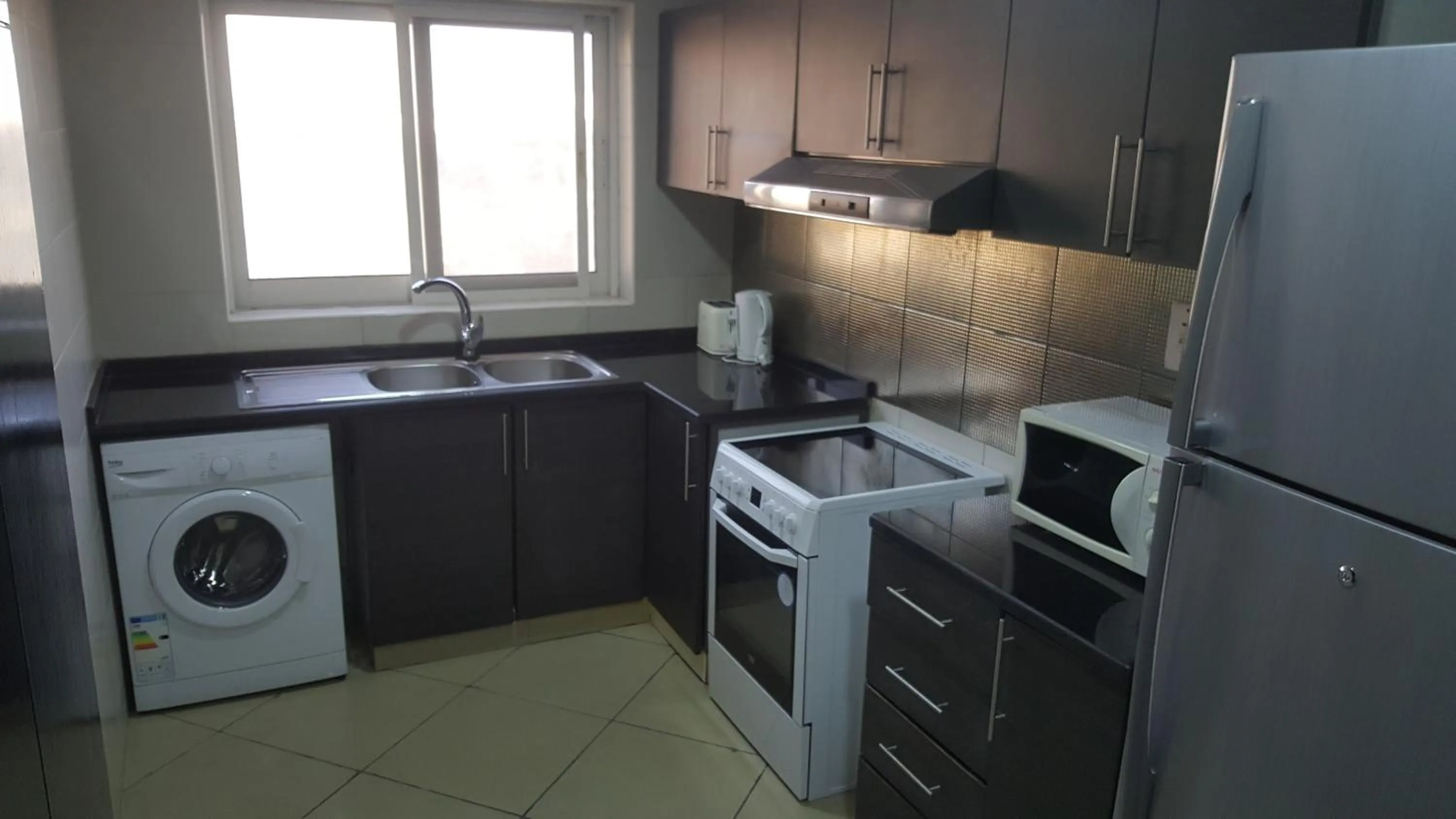 Kitchen or kitchenette in Boulevard City Suites Hotel Apartments