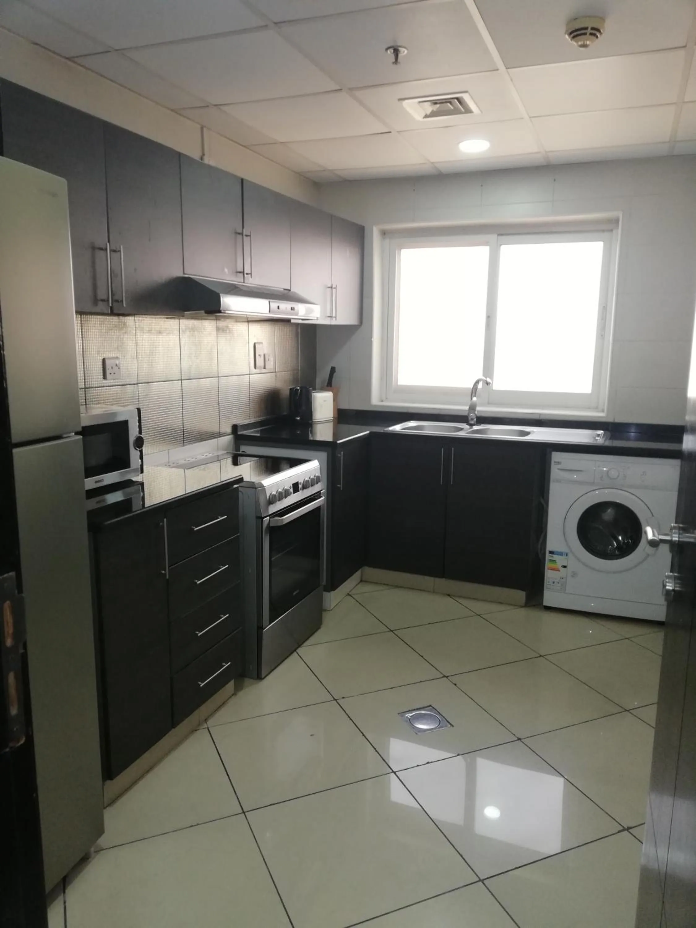 Kitchen or kitchenette in Boulevard City Suites Hotel Apartments