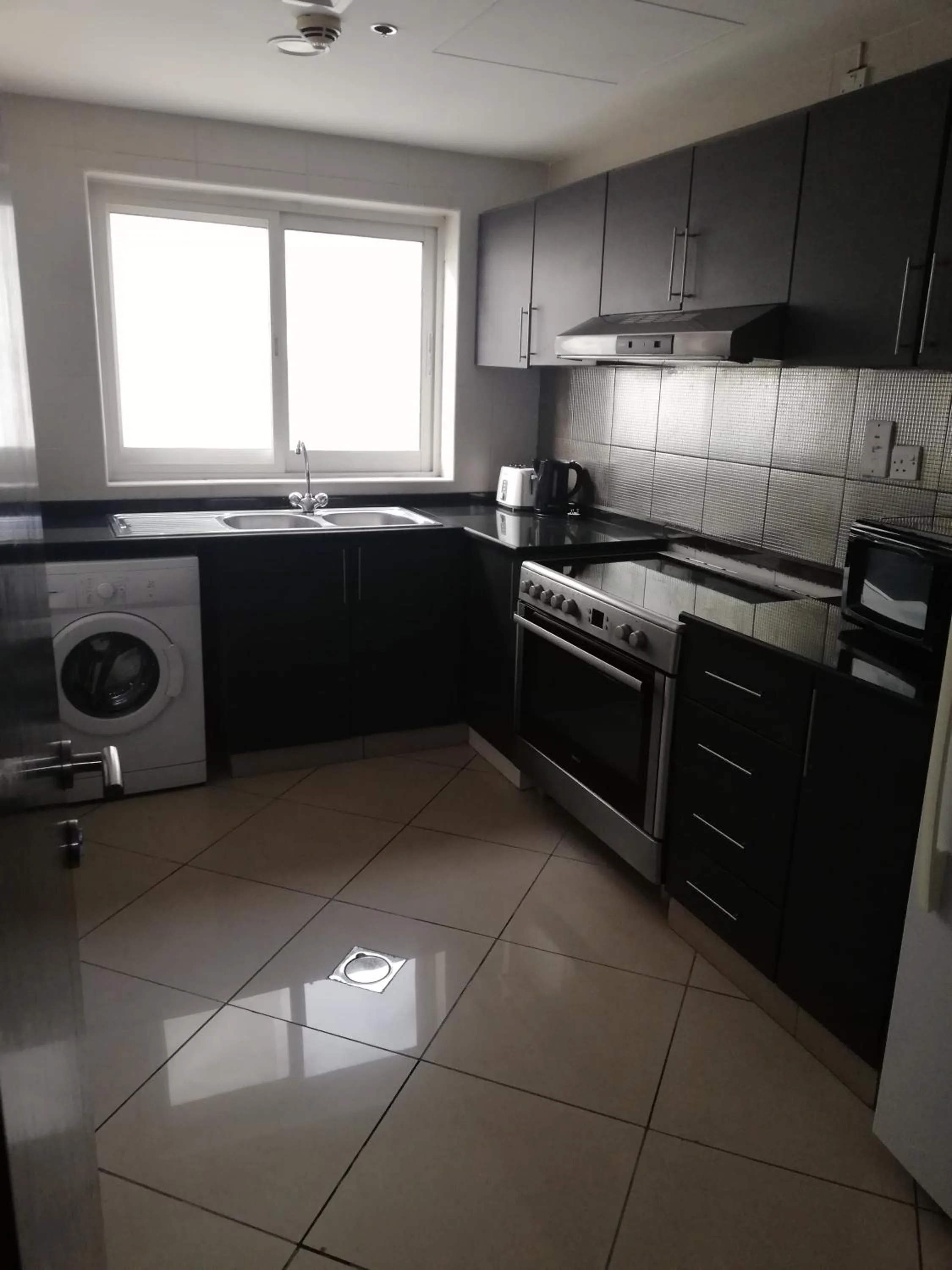 Kitchen or kitchenette in Boulevard City Suites Hotel Apartments