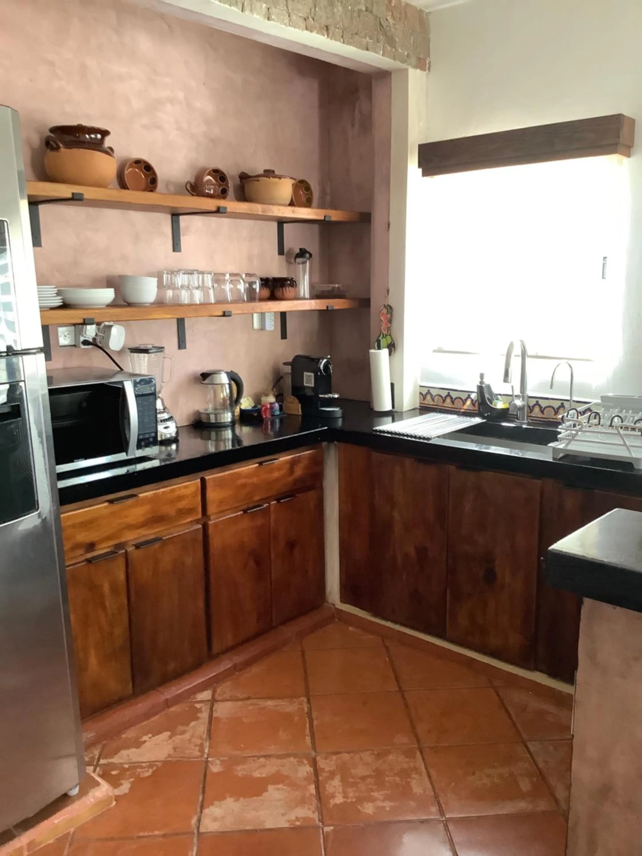 Kitchen or kitchenette in Casa Bene Villas