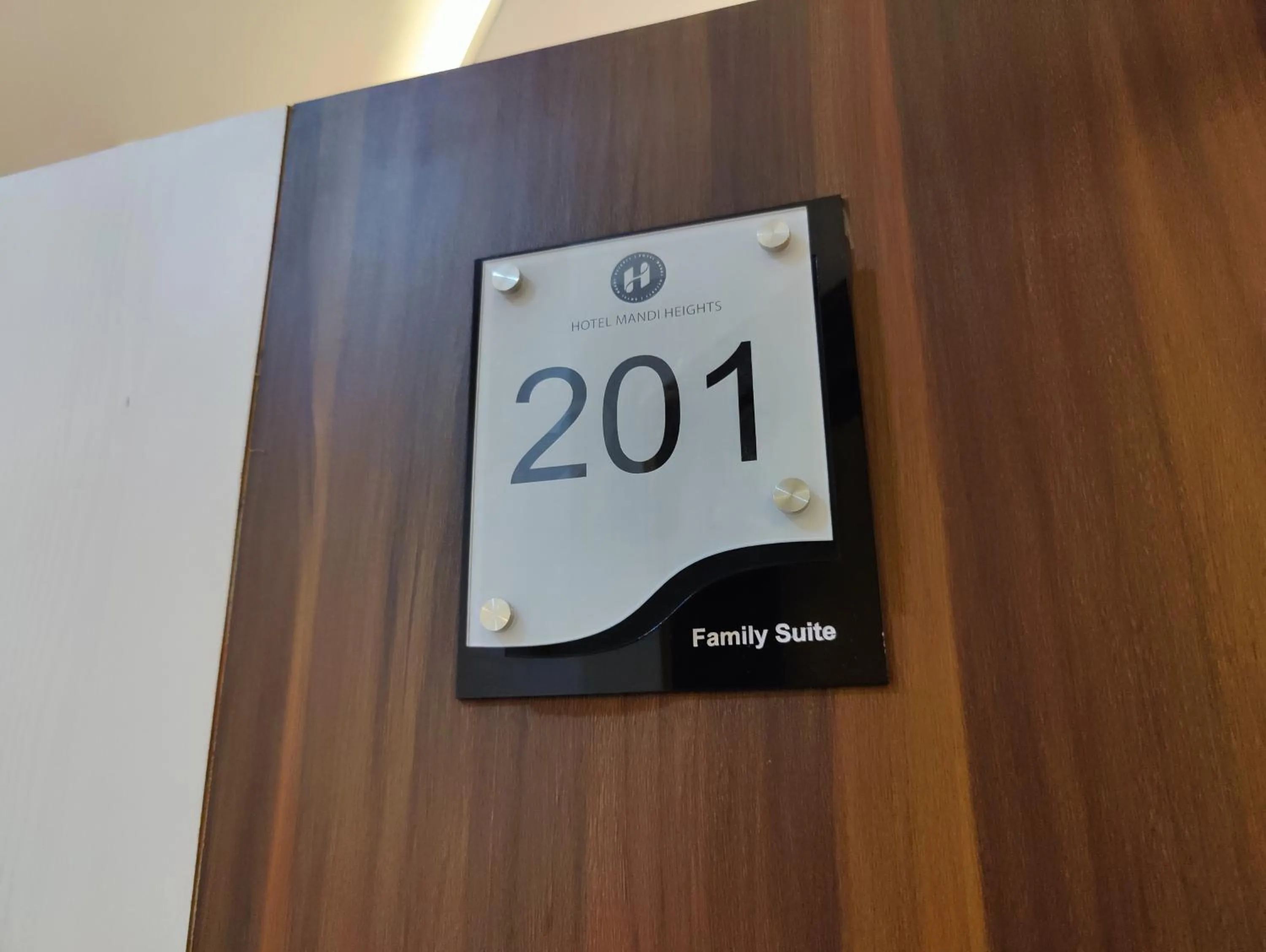 Logo/Certificate/Sign in Hotel Mandi Heights - Bar, Fine Dining & Banquet Hall