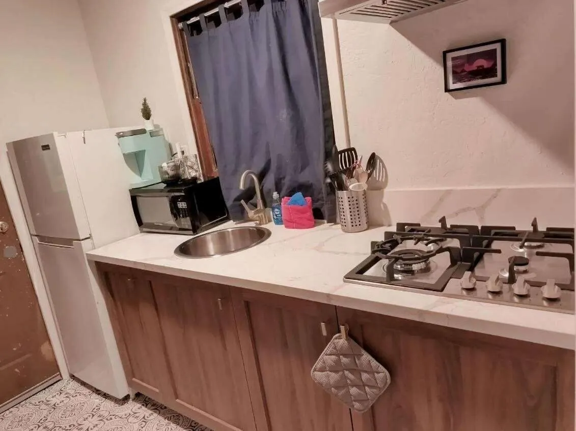 Kitchen or kitchenette in Three Pines Cabins