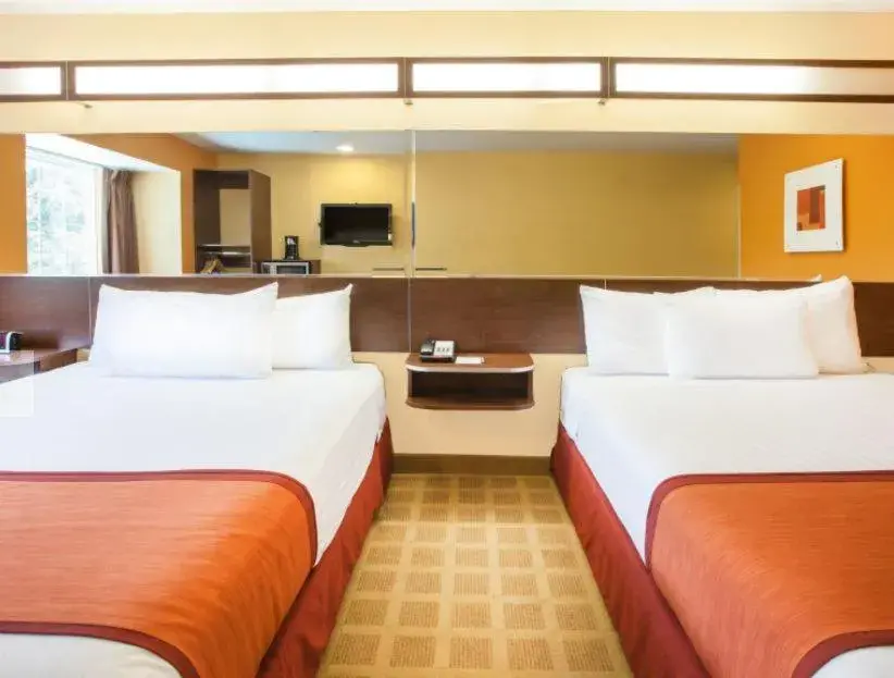 Bedroom, Bed in Microtel Inn by Wyndham Stillwater Bedroom, Bed in Microtel Inn by Wyndham Stillwater