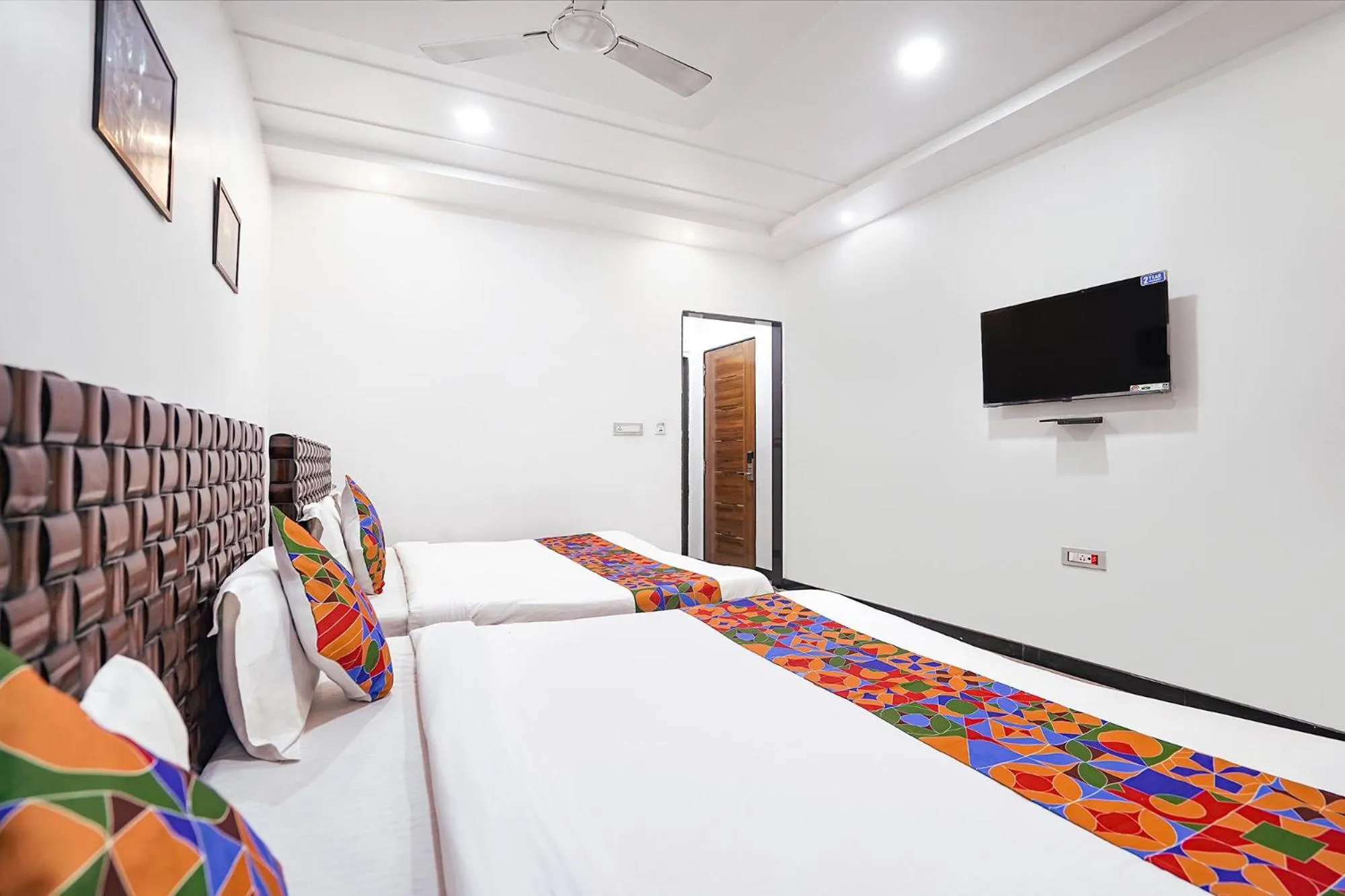 Bed in FabHotel Villa De Benares - Tulsi Manas Mandir