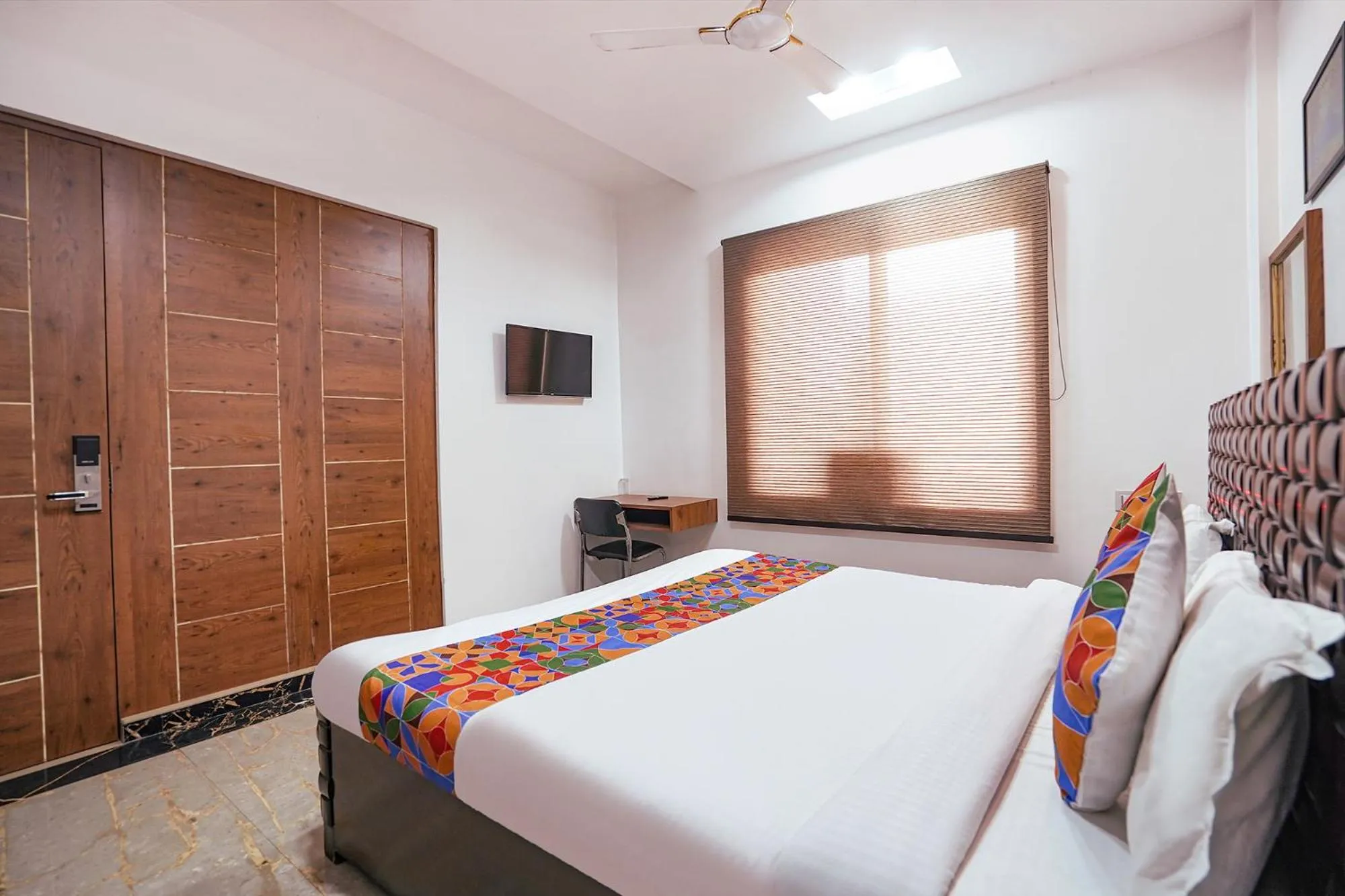 Bed in FabHotel Villa De Benares - Tulsi Manas Mandir