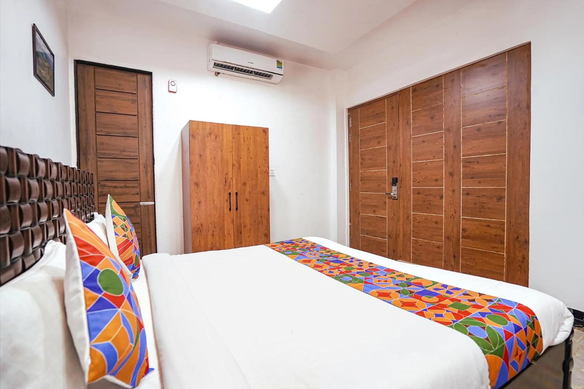 Bed in FabHotel Villa De Benares - Tulsi Manas Mandir