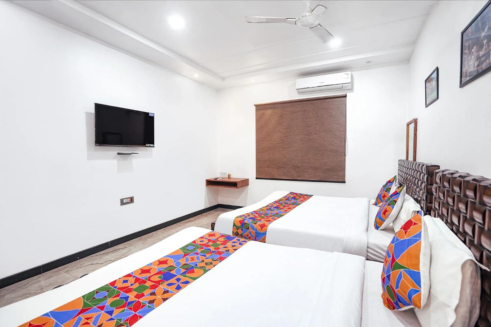 Bed in FabHotel Villa De Benares - Tulsi Manas Mandir