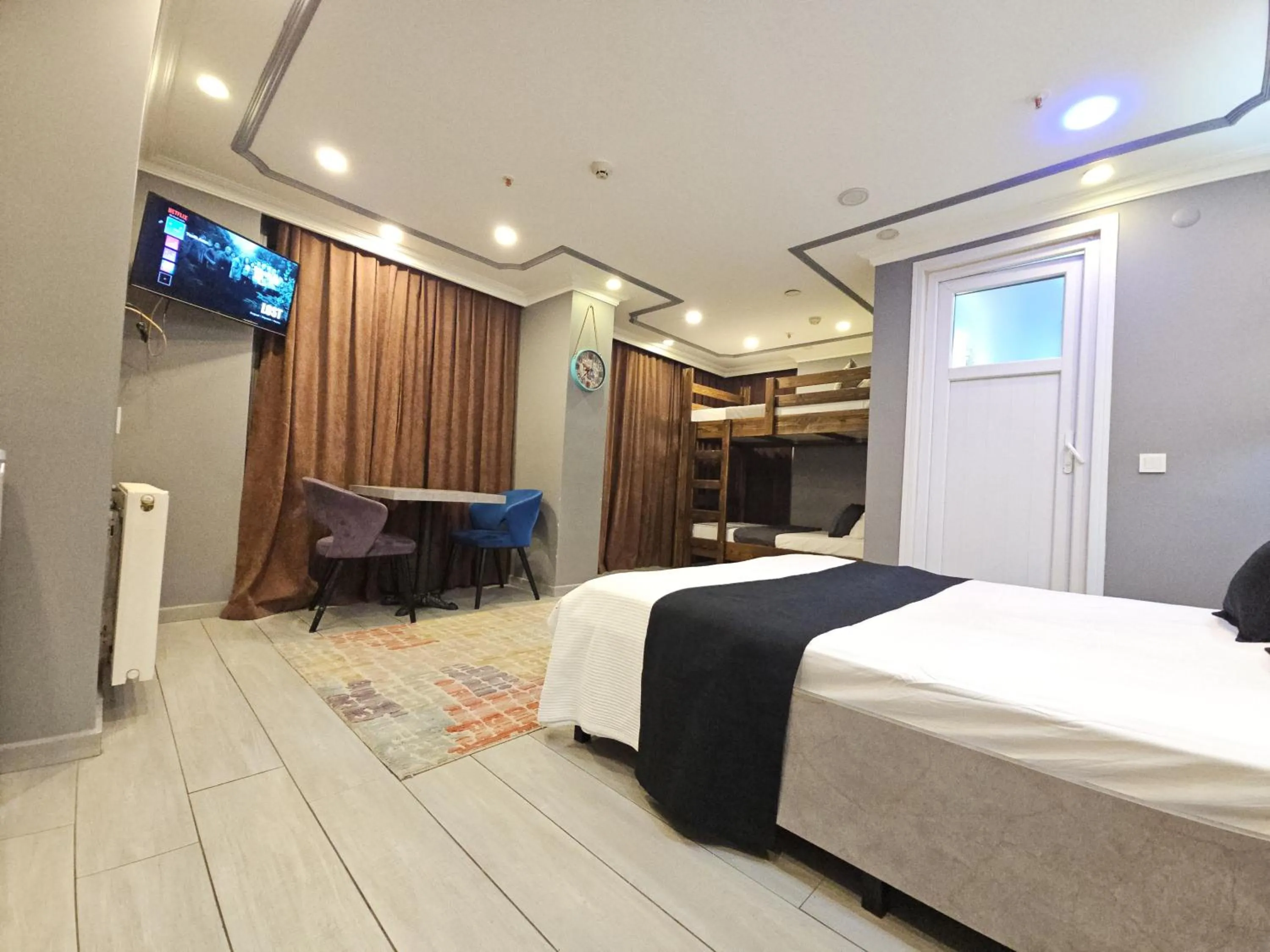 Communal lounge/ TV room, Bed in Sahrakent Otel Pendik