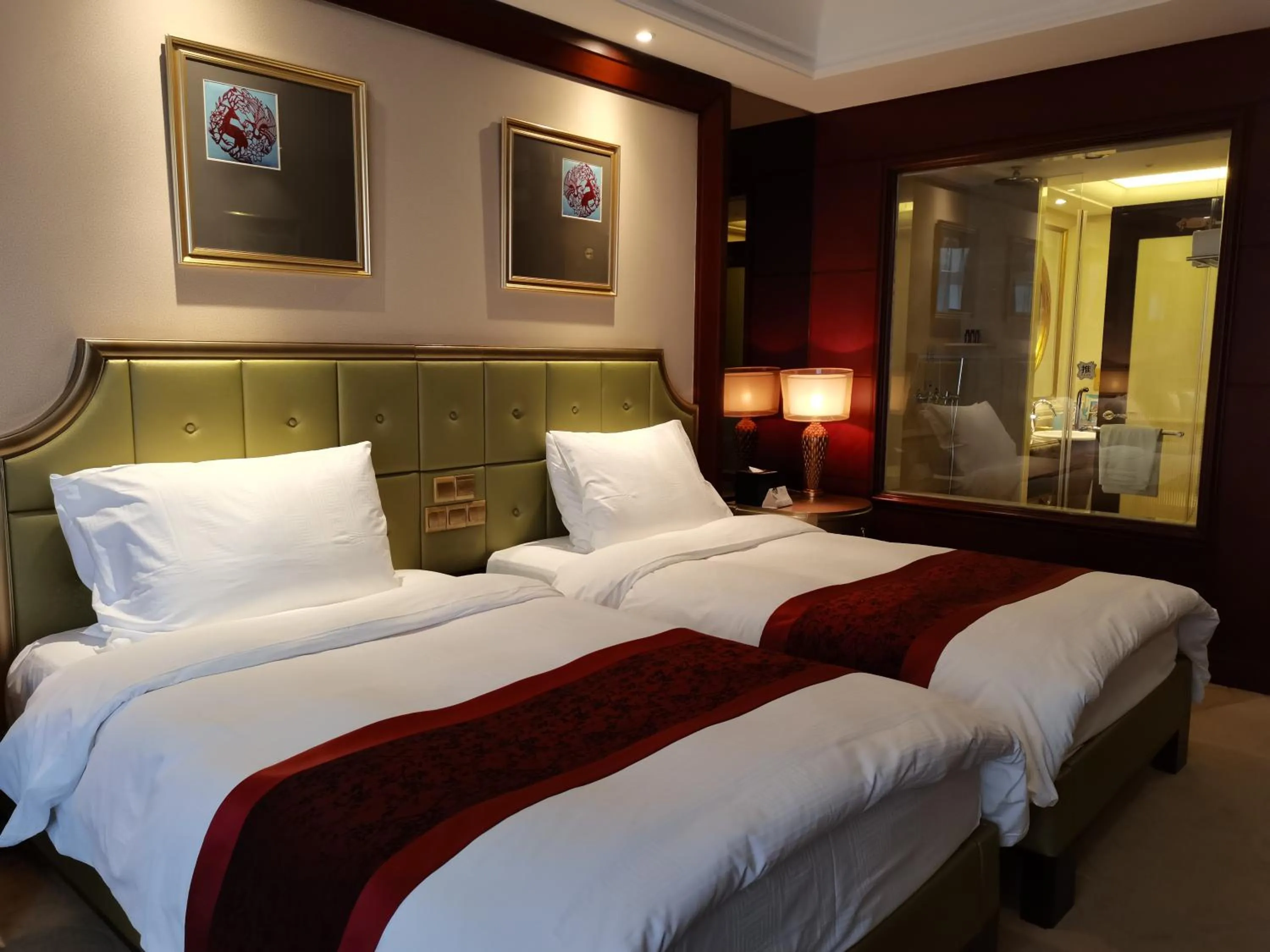 Bed in Dynasty International Hotel Dalian