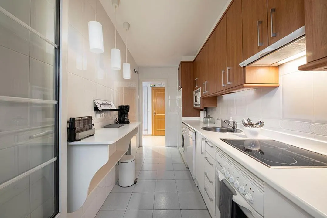 Kitchen or kitchenette in Apartamento Tíbula Sur Parking