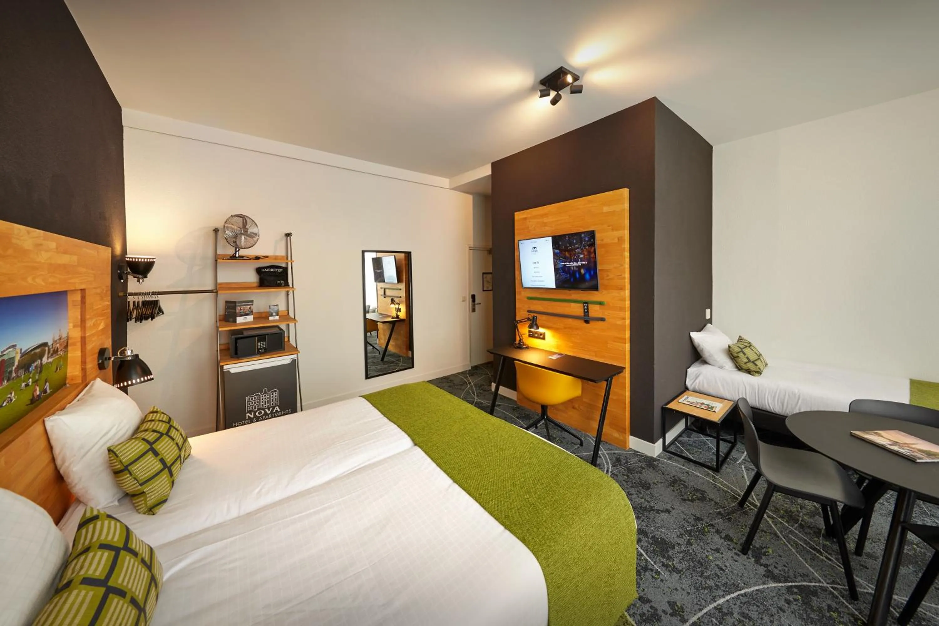 TV and multimedia, Bed in Nova Hotel