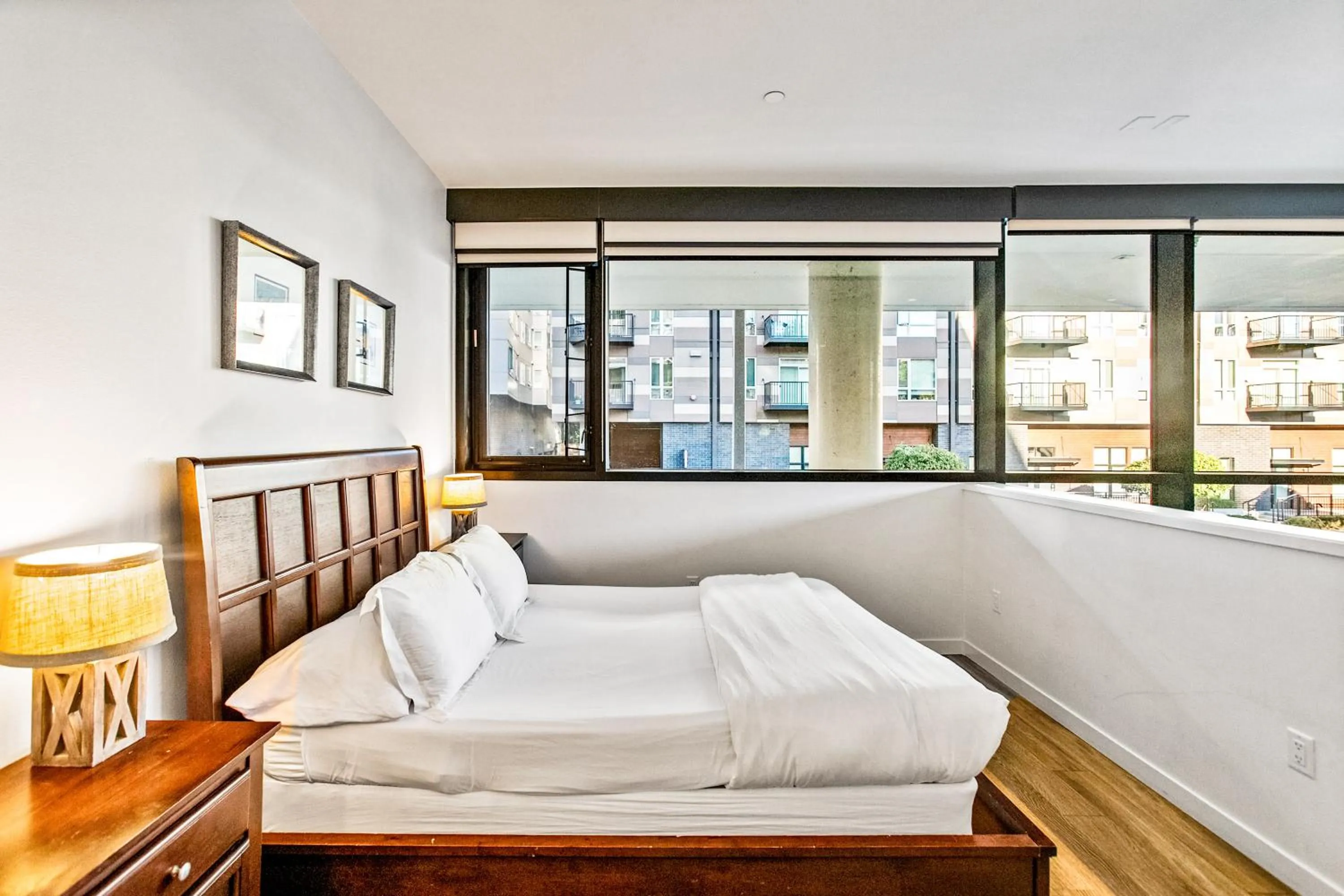 Bedroom, Bed in Airy and Open Corner Loft - 92 Walkscore
