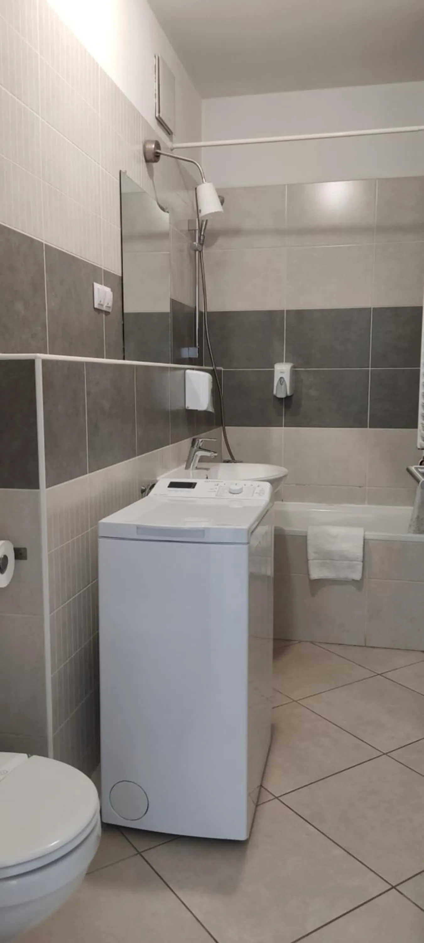 Bathroom in Corvin Center Suites