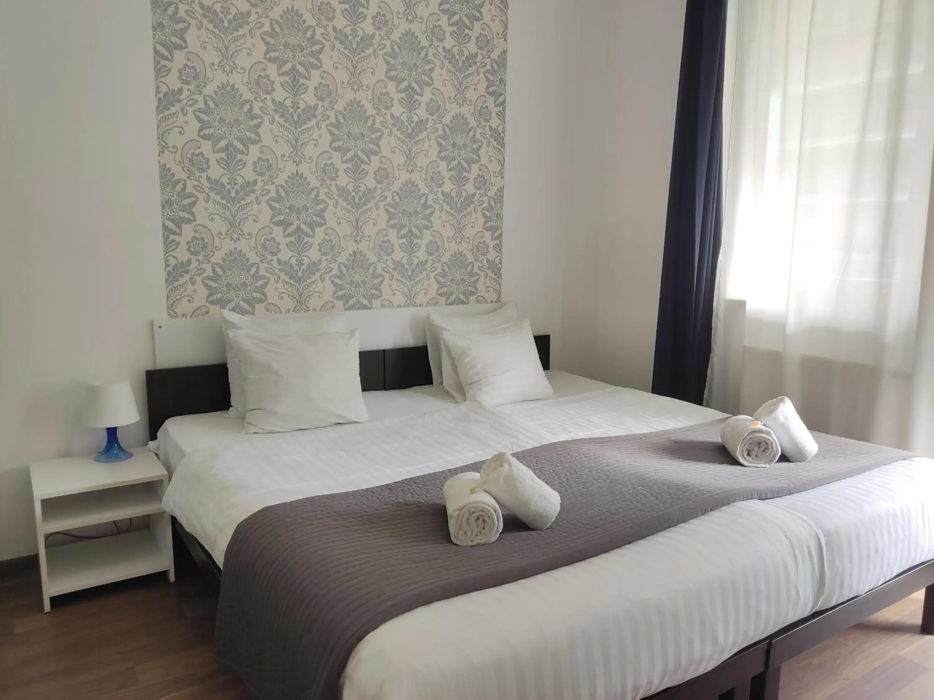 Bed in Corvin Center Suites Bed in Corvin Center Suites