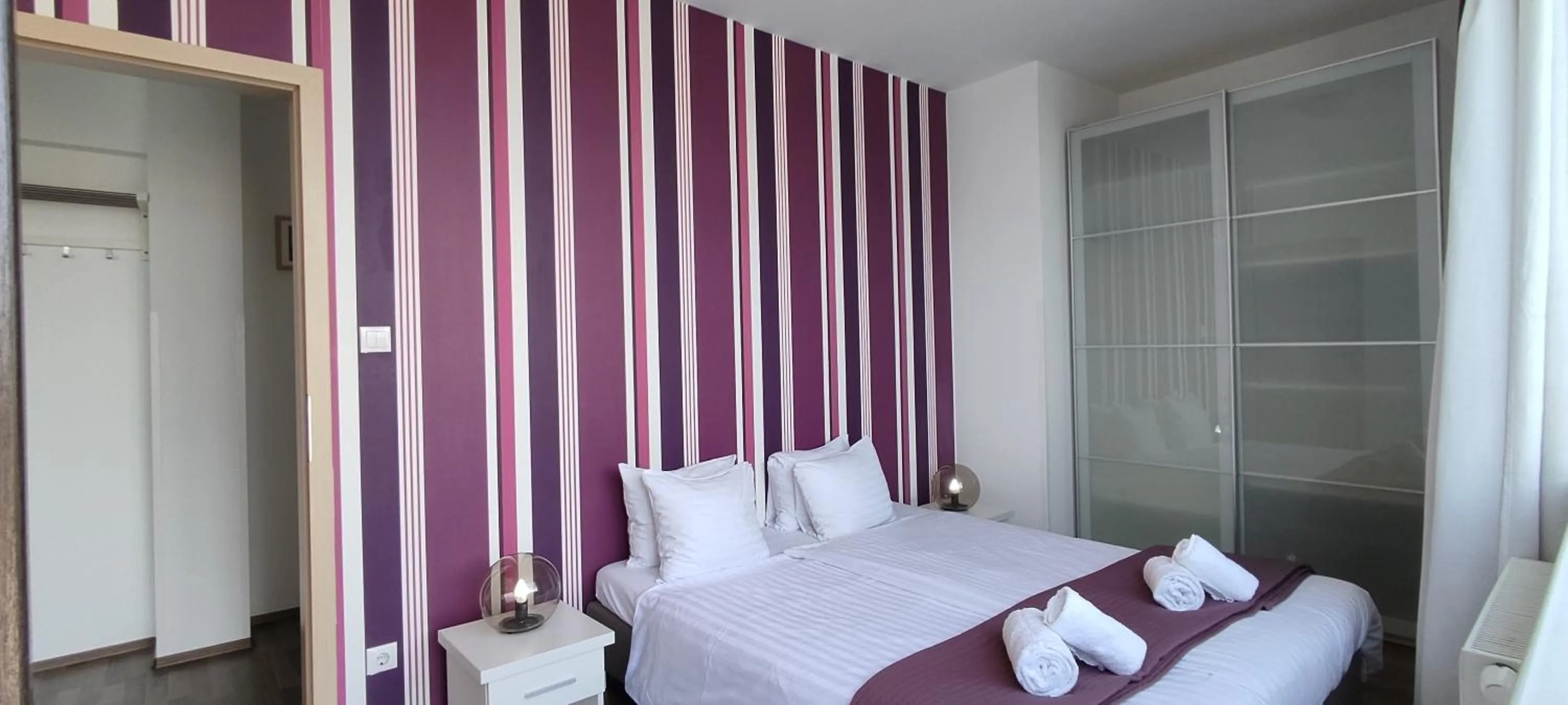 Bedroom, Bed in Corvin Center Suites