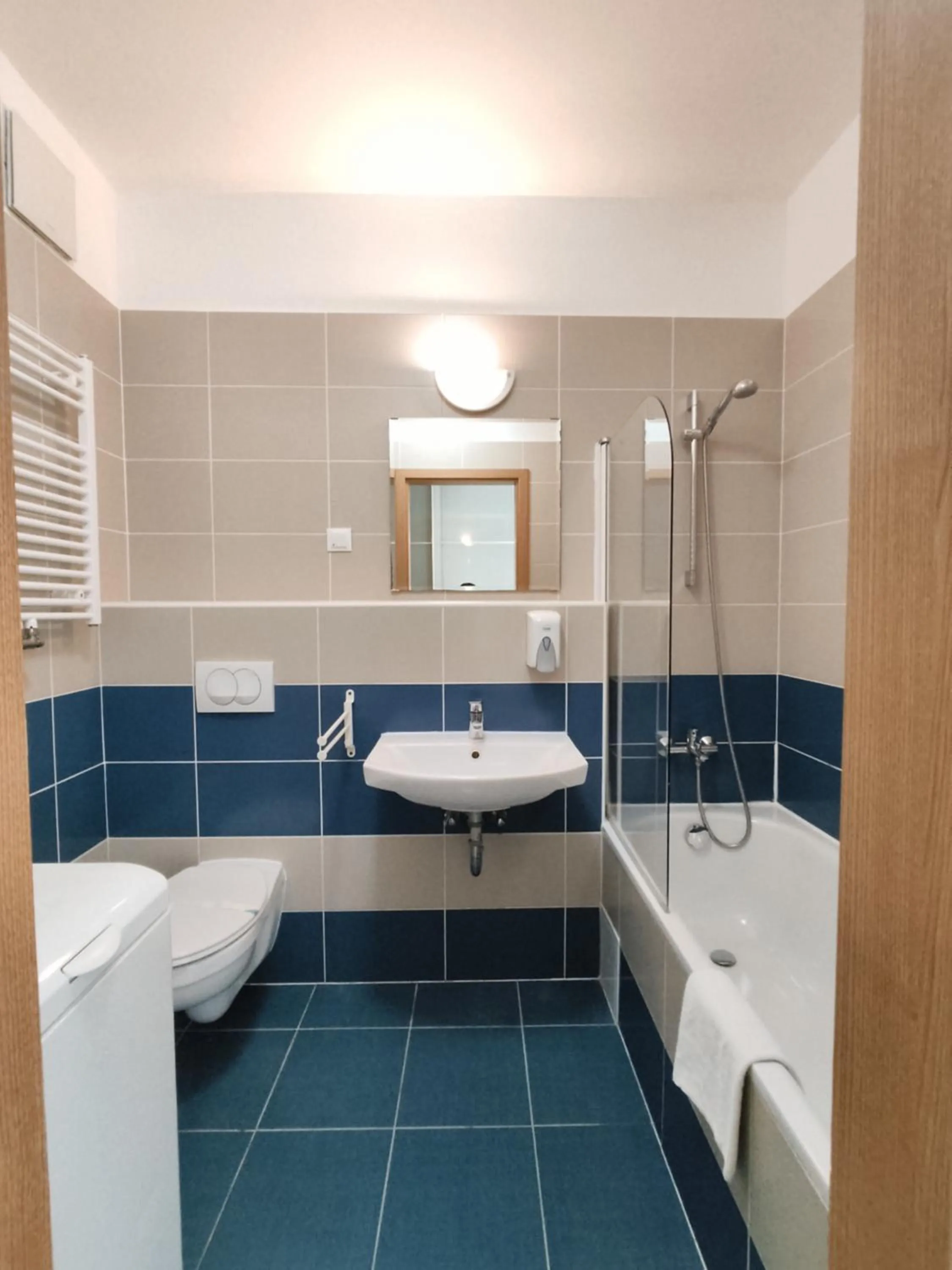 Bathroom in Corvin Center Suites