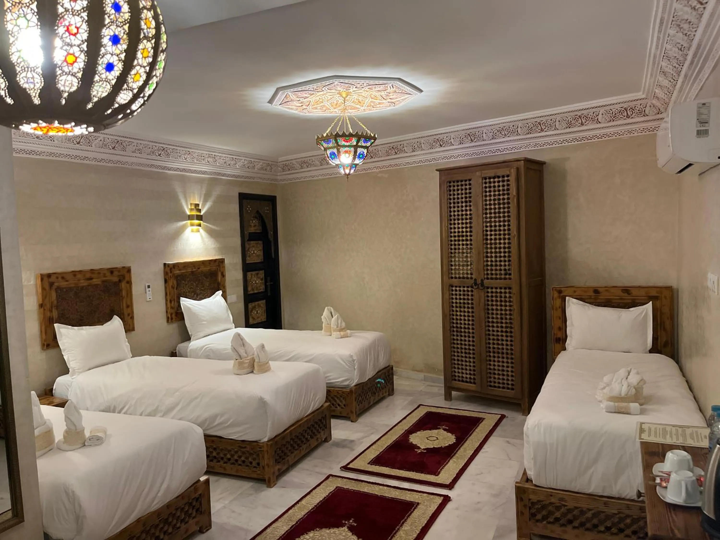 Bed in Riad Deluxe