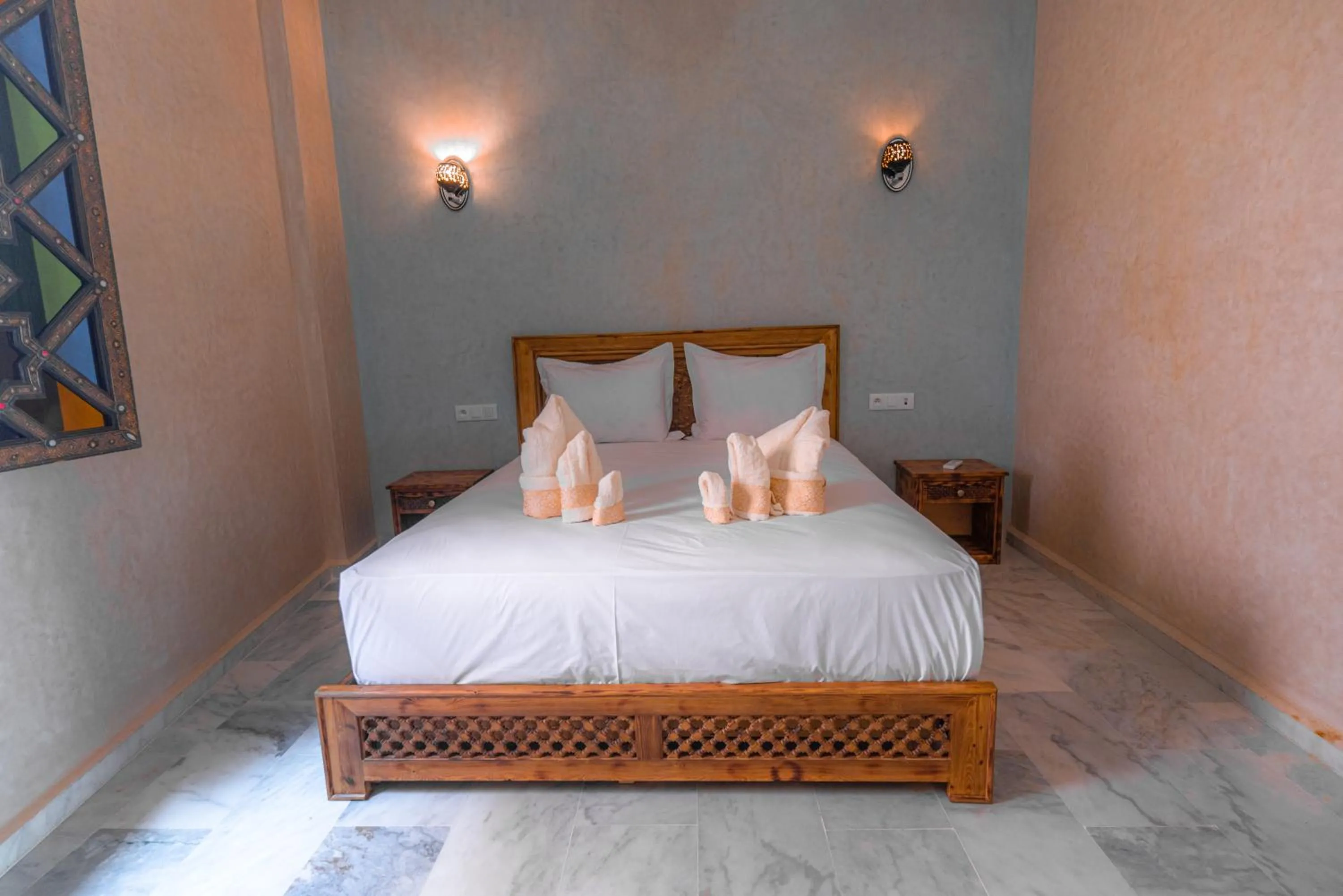 Bed in Riad Deluxe