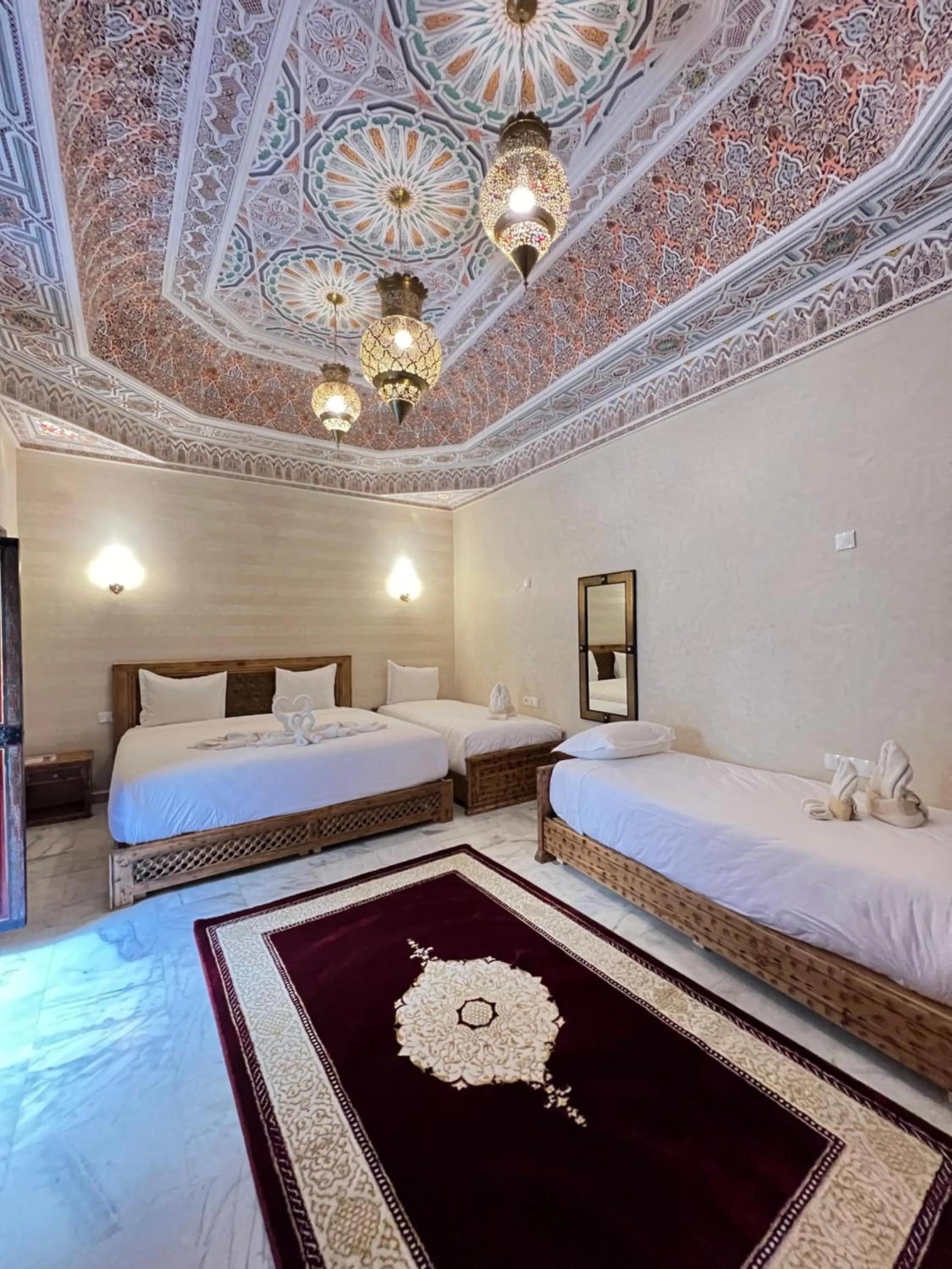 Bed in Riad Deluxe