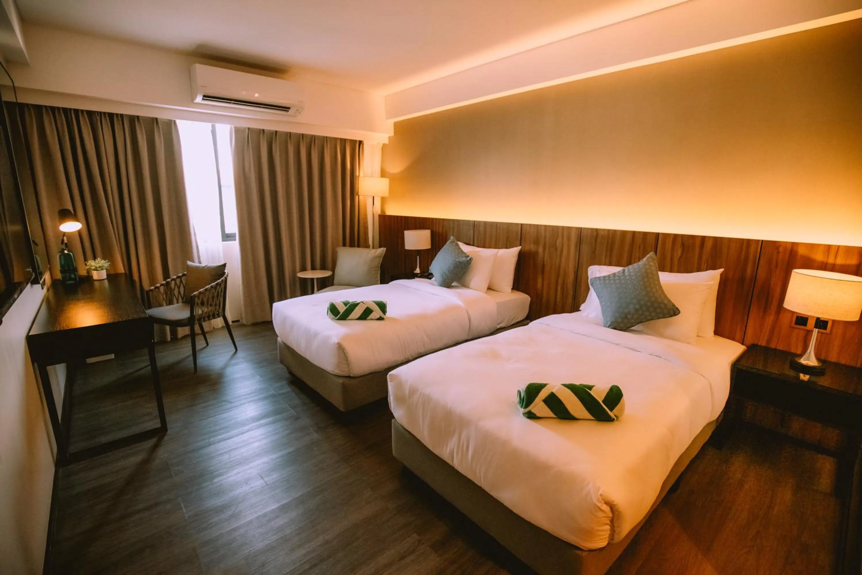 Bed in The Maximilian Hotel