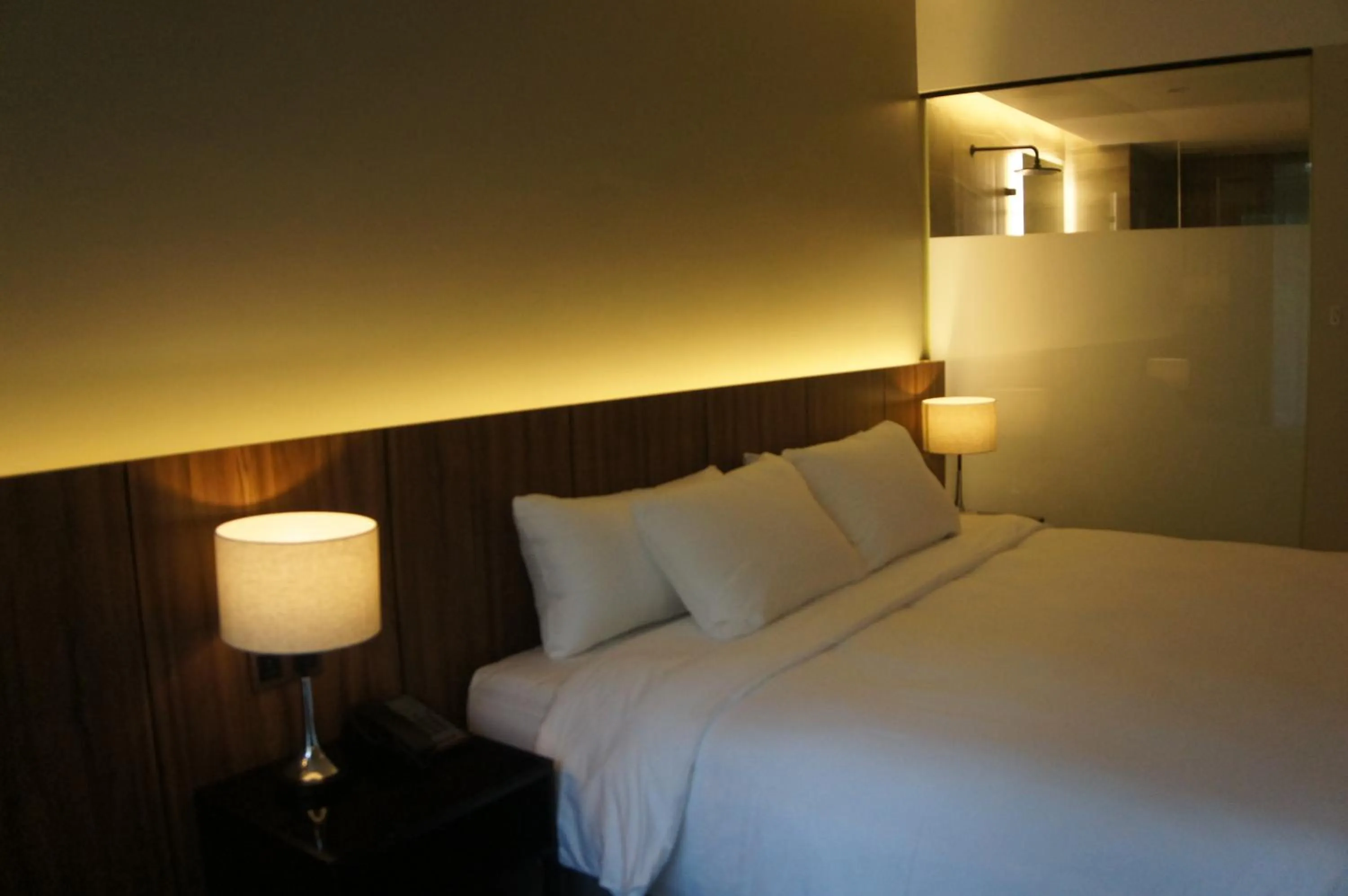 Bed in The Maximilian Hotel