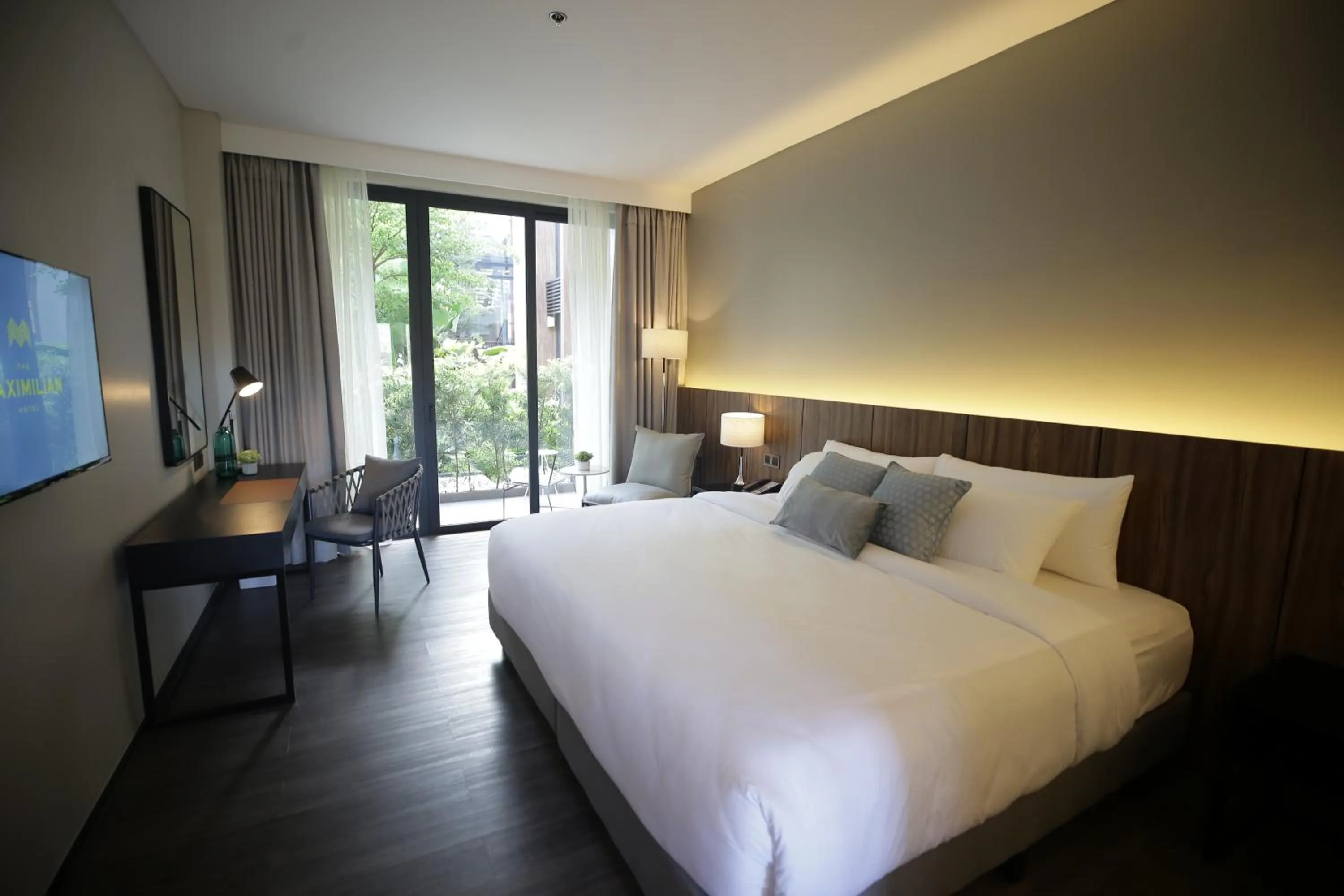 Bed in The Maximilian Hotel