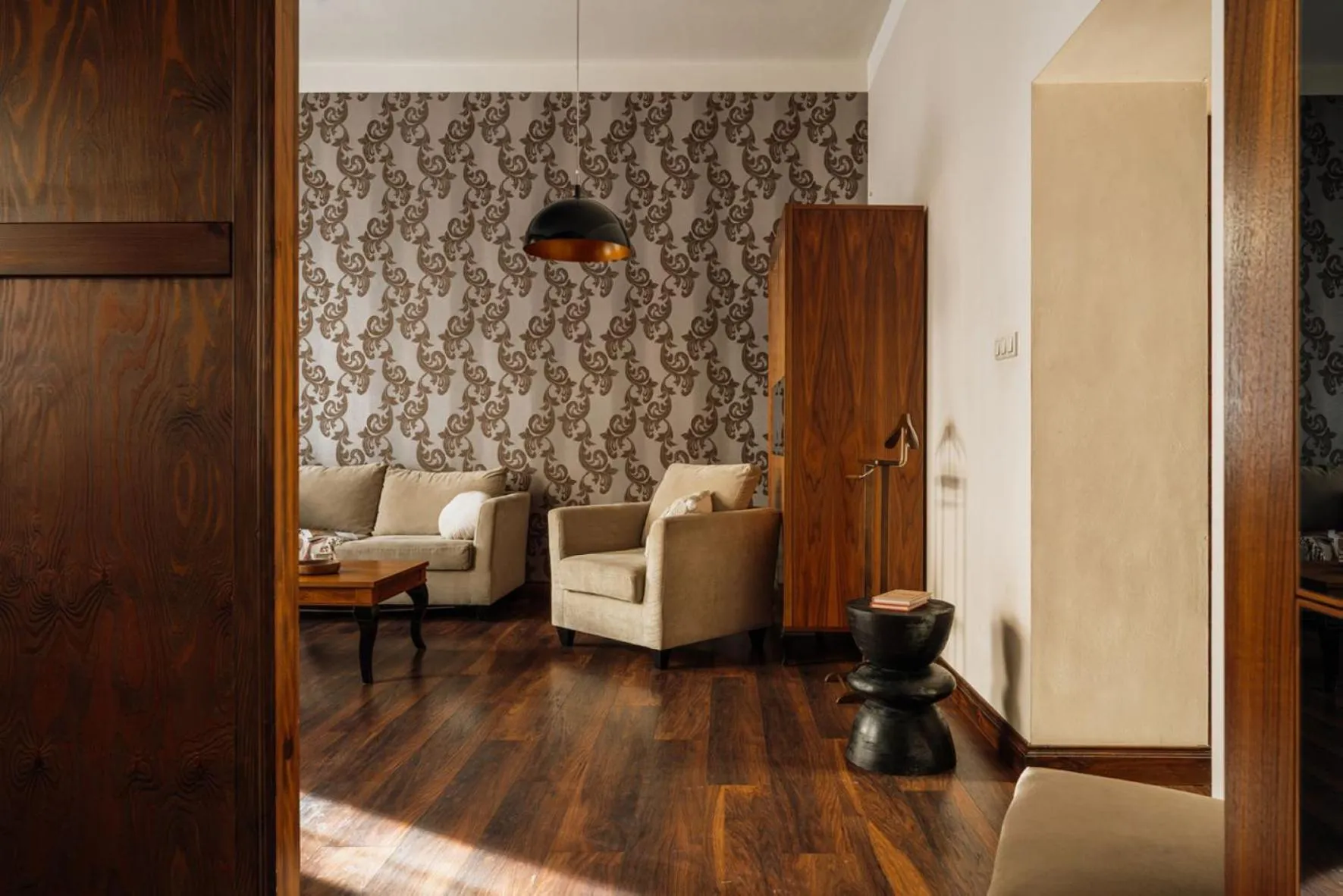 Seating area in Topolowa Residence by StayLab