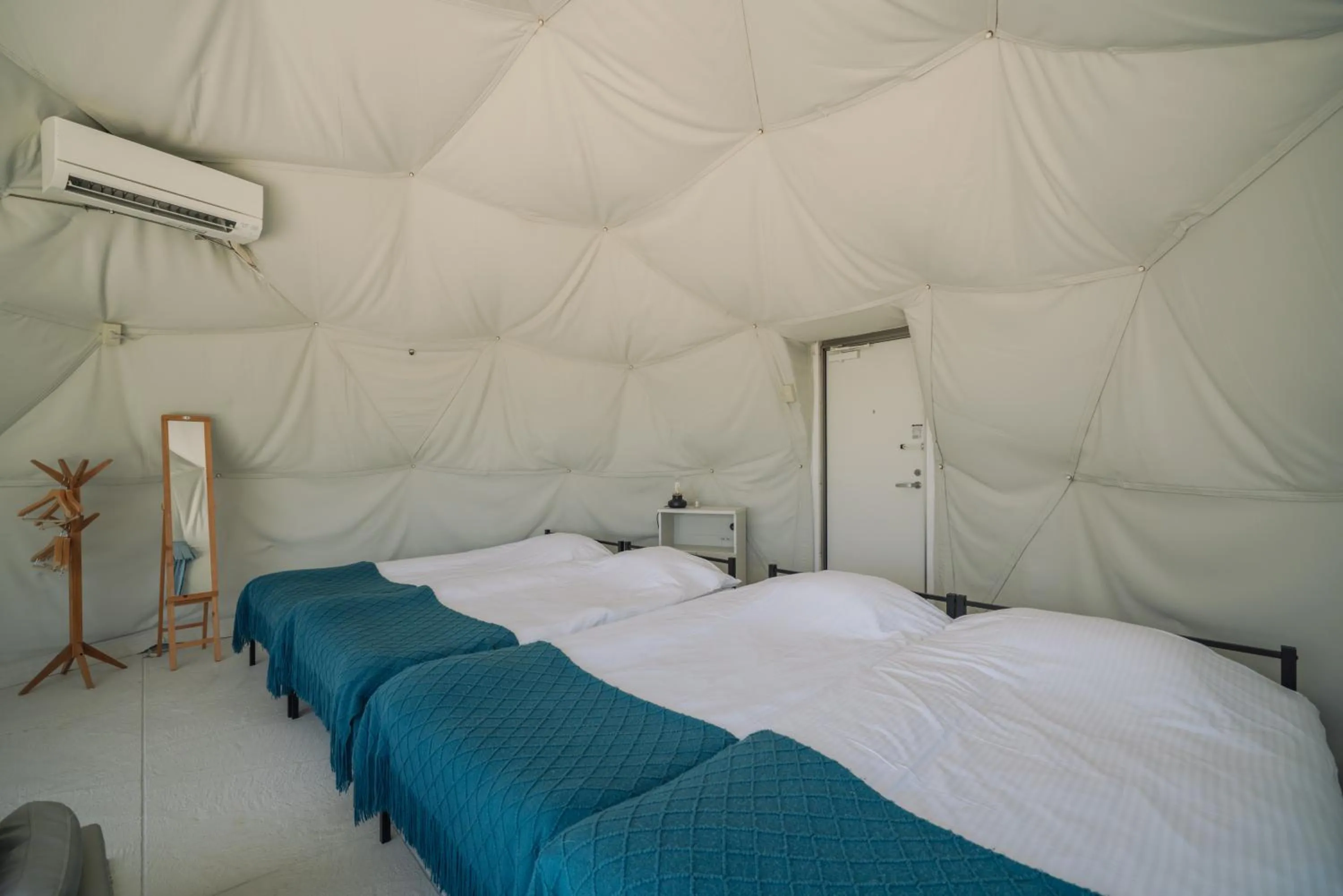 Bedroom in glampark resort Akuna beach