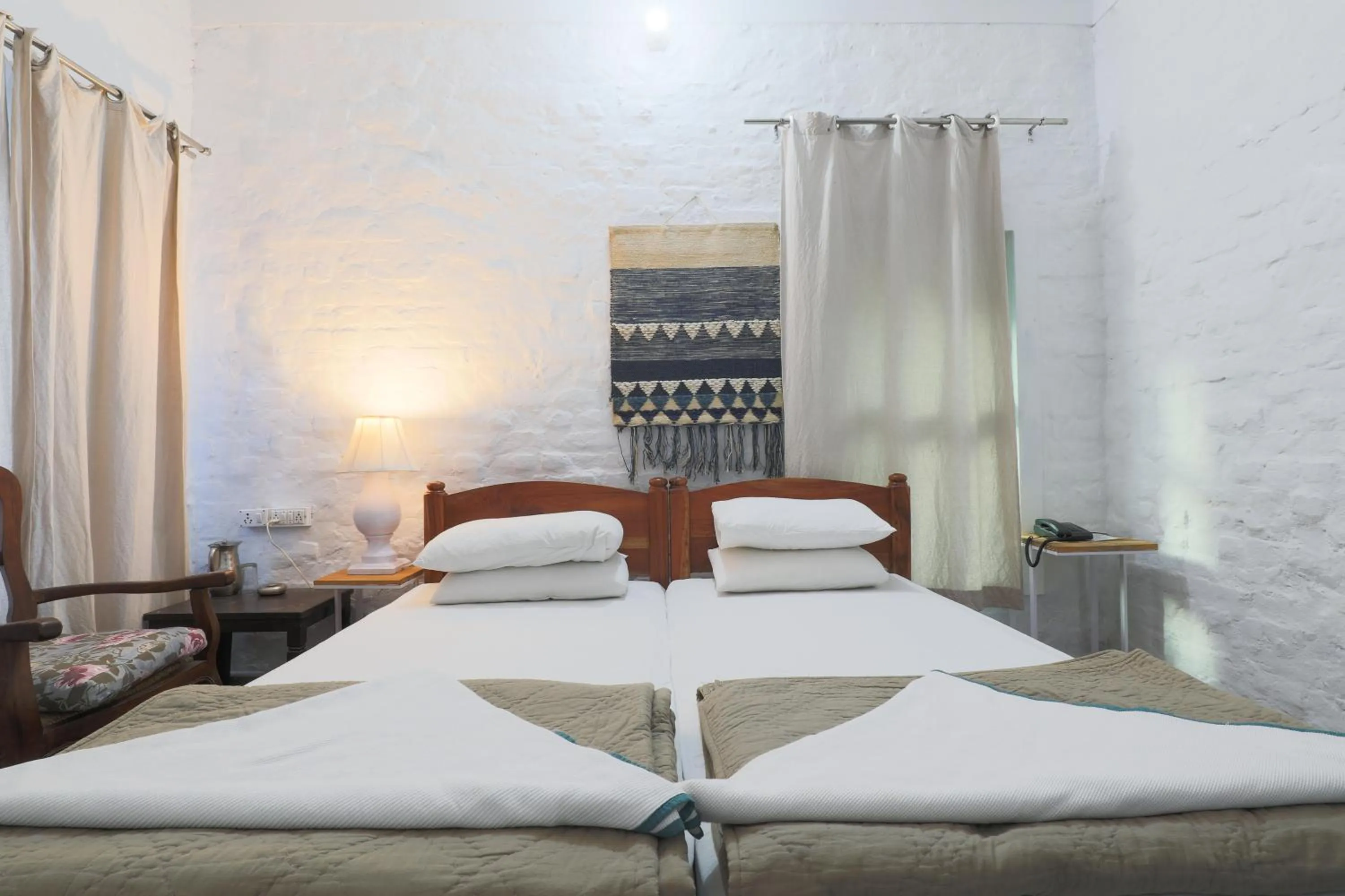 Bed in MANJARI RESORT