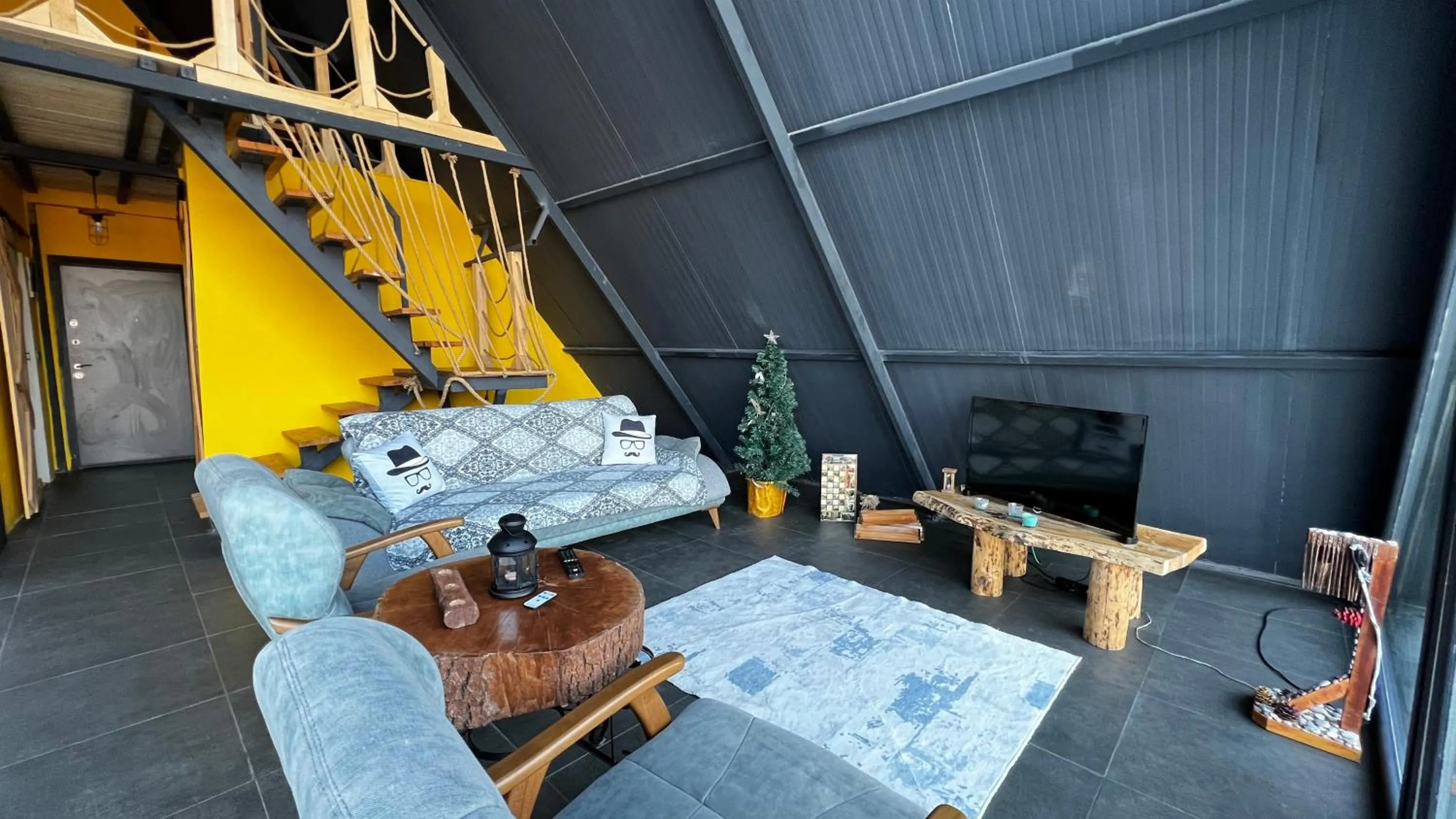 Communal lounge/ TV room in villa hidden paradise garden