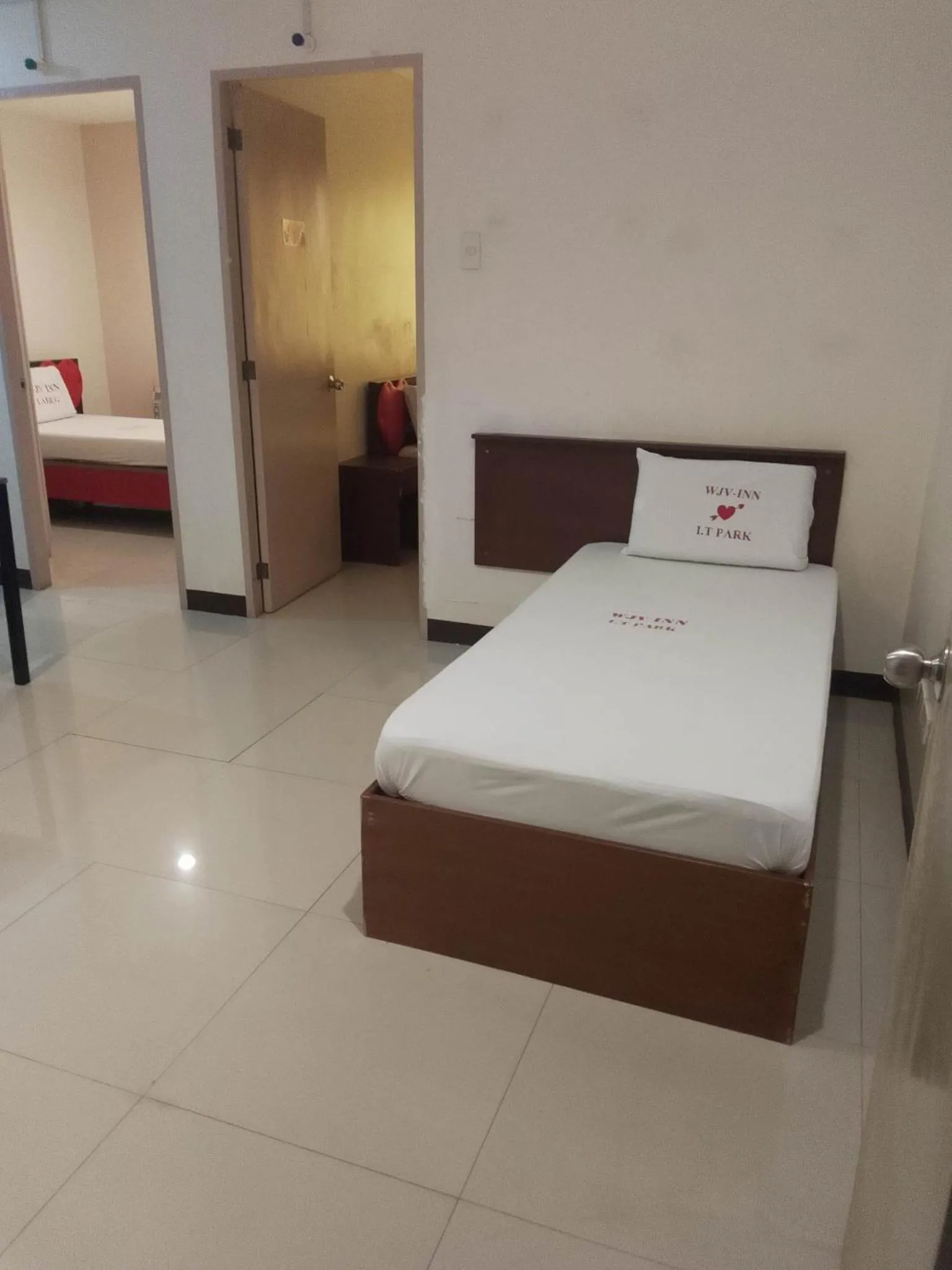 Bed in WJV INN LAHUG