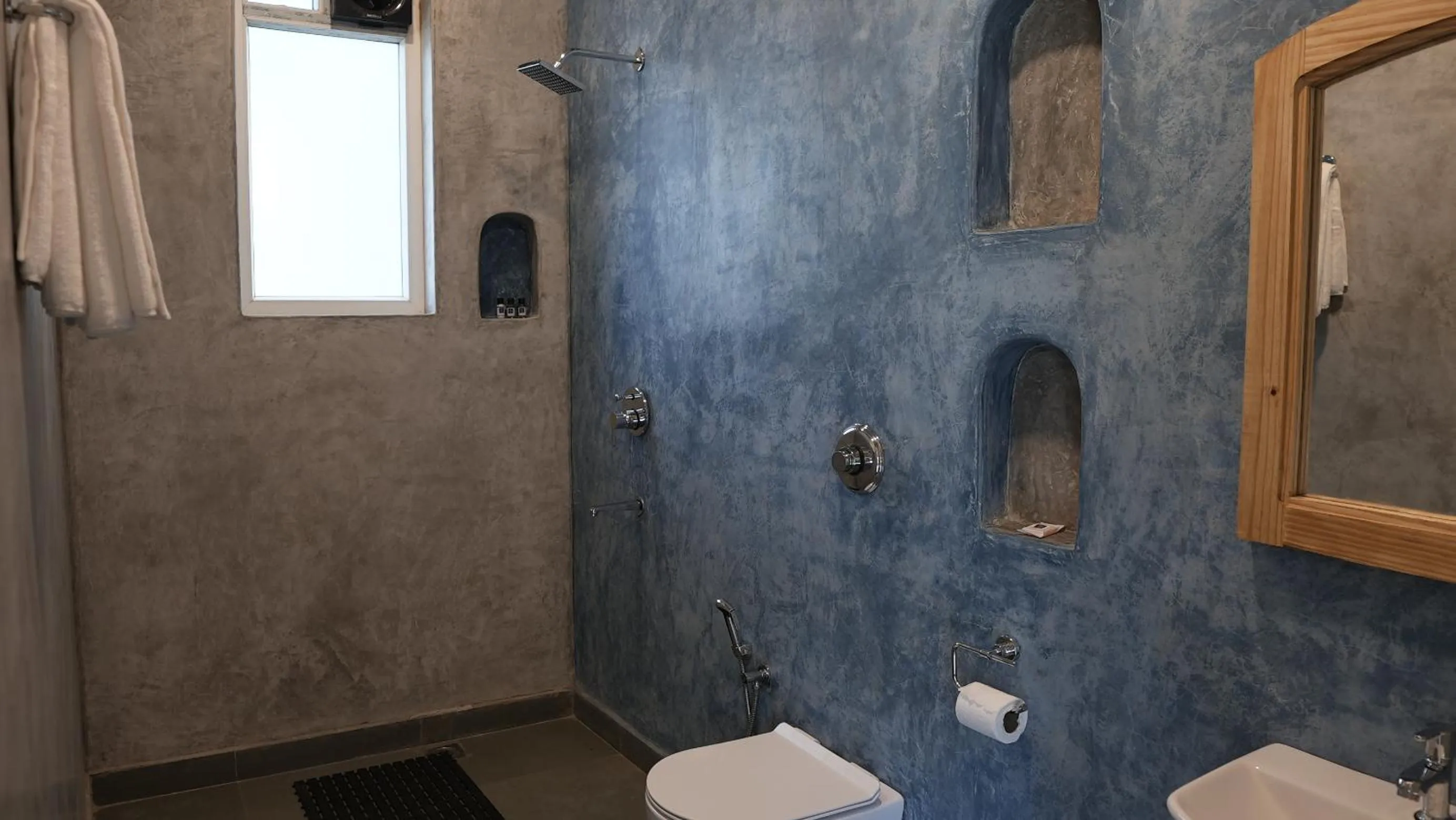 Bathroom in Whiteflower Resort Morjim