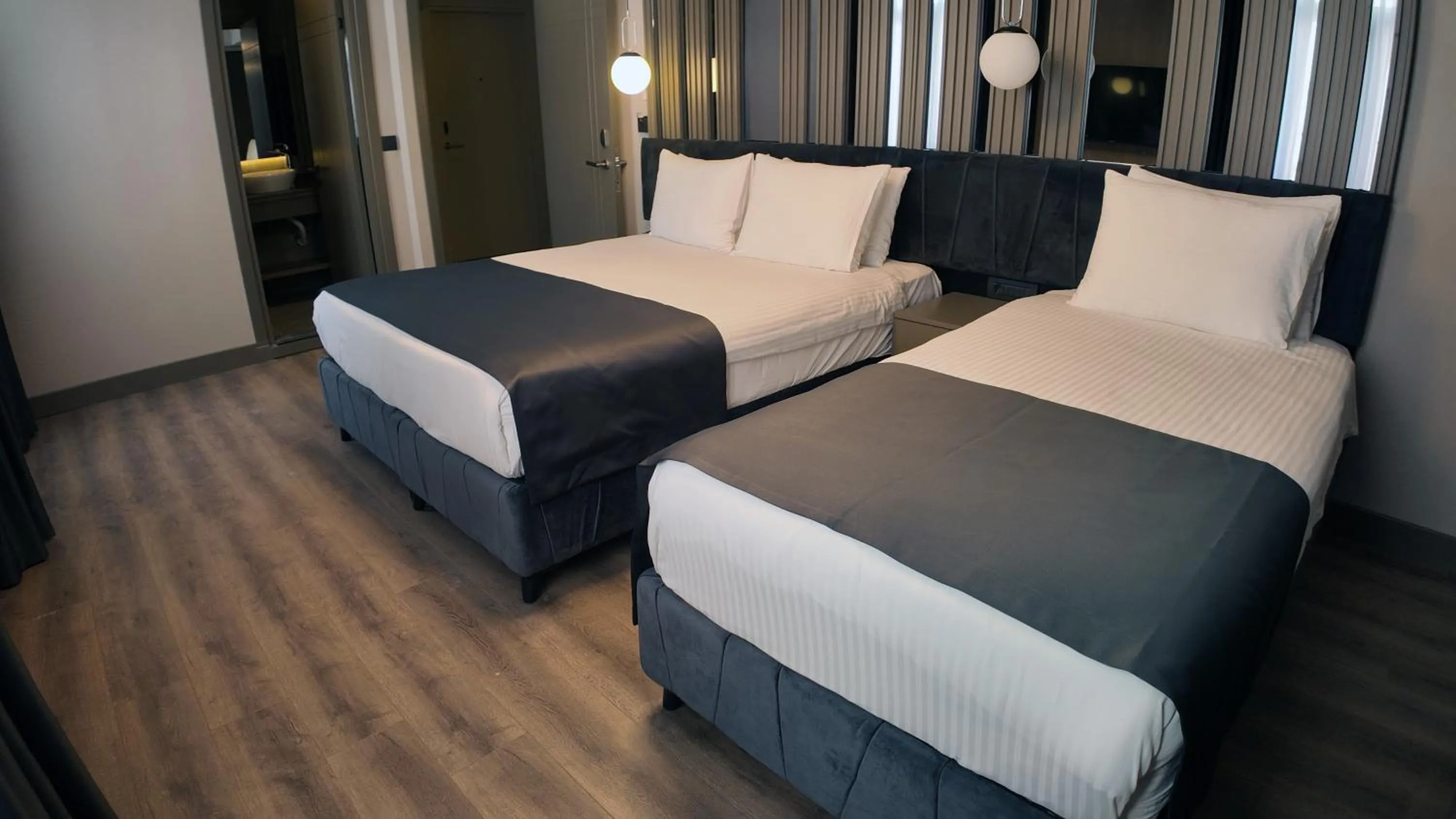 Bed in THE NEST HOTEL