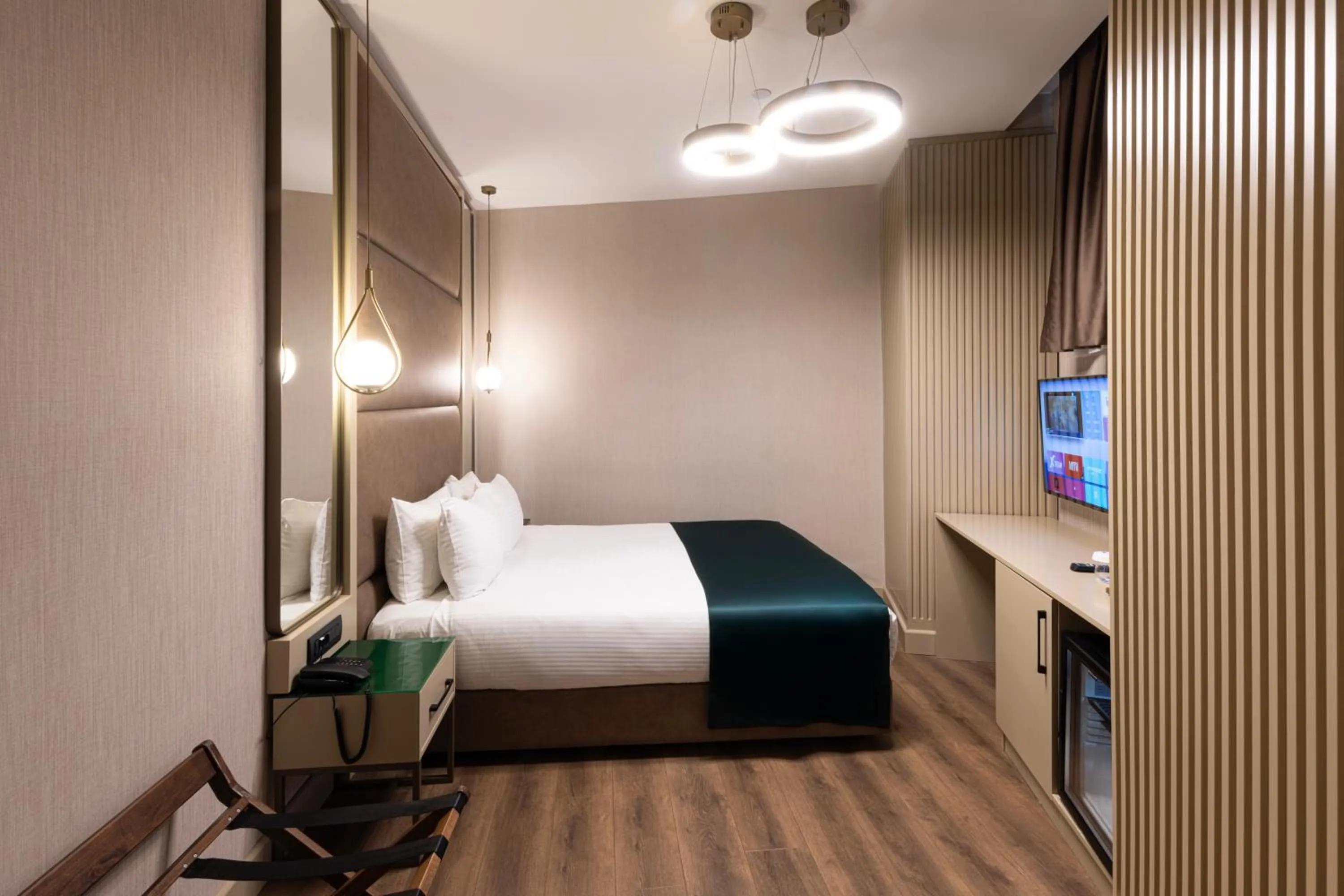 Bed in THE NEST HOTEL