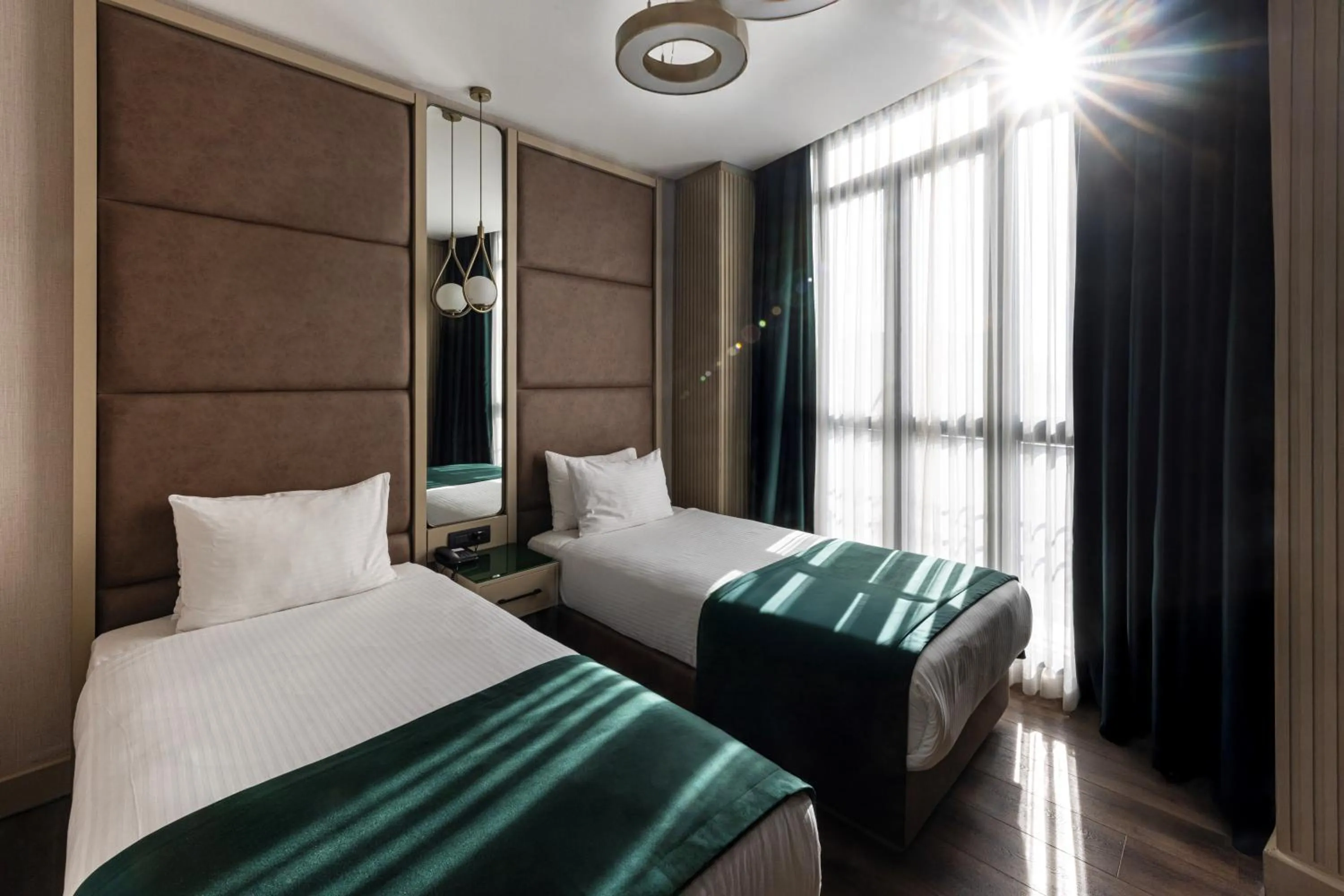 Bed in THE NEST HOTEL