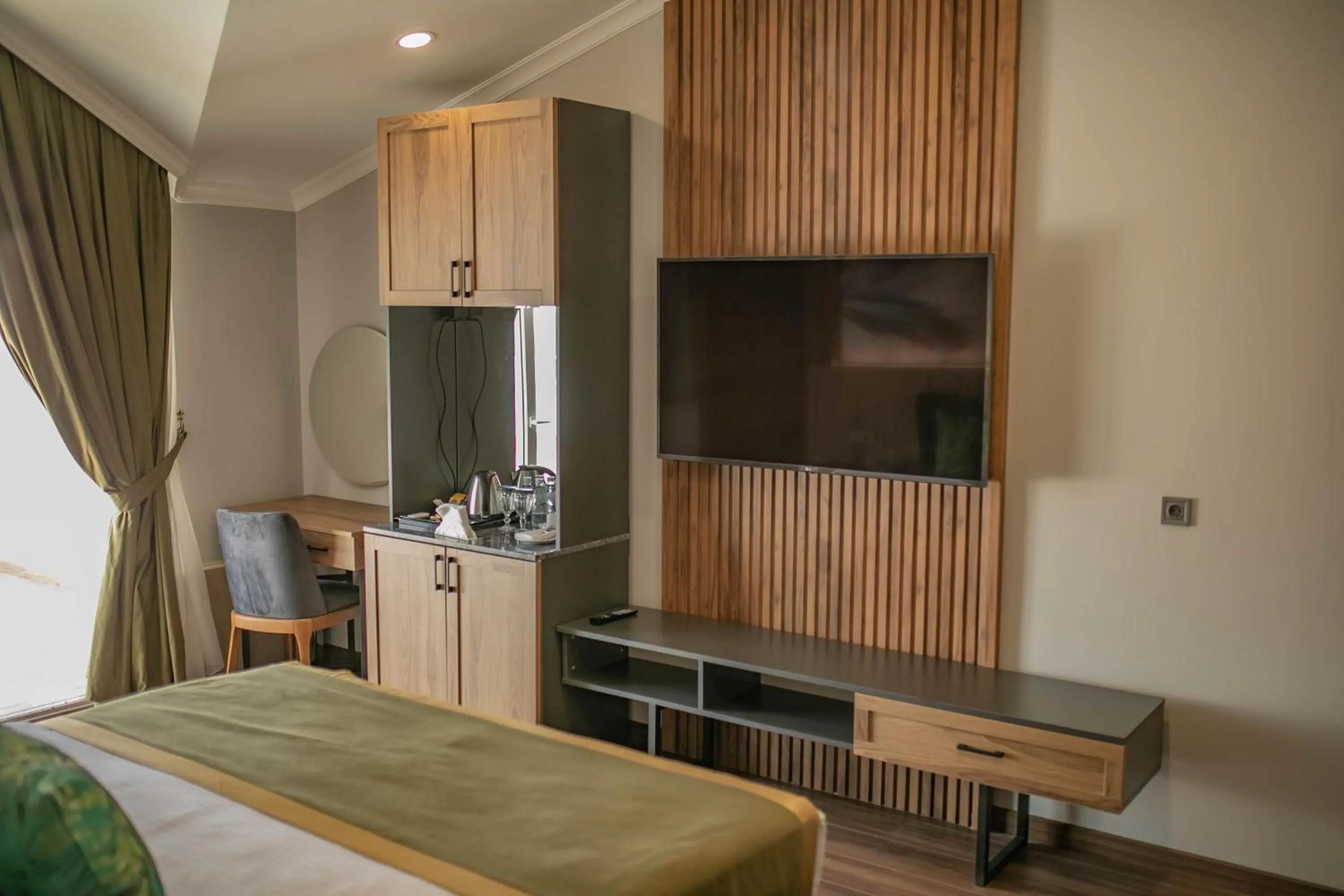 Bed in The Green Oasis Otel Spa