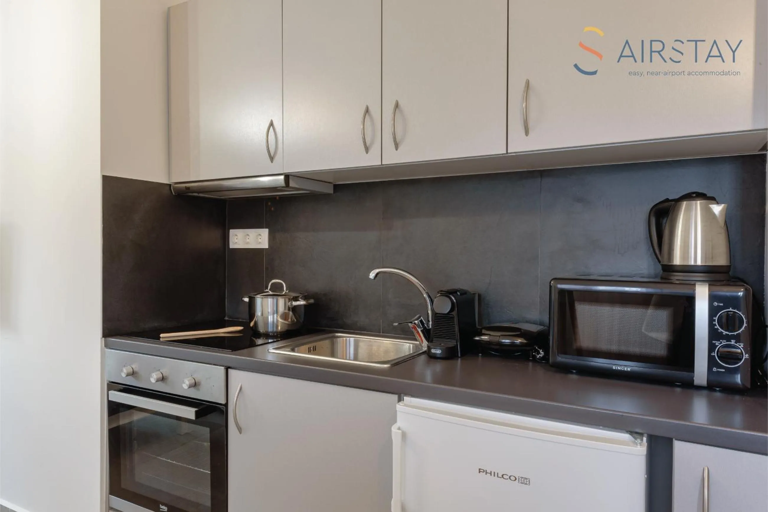 kitchen in Ryze Apartments Airport by Airstay