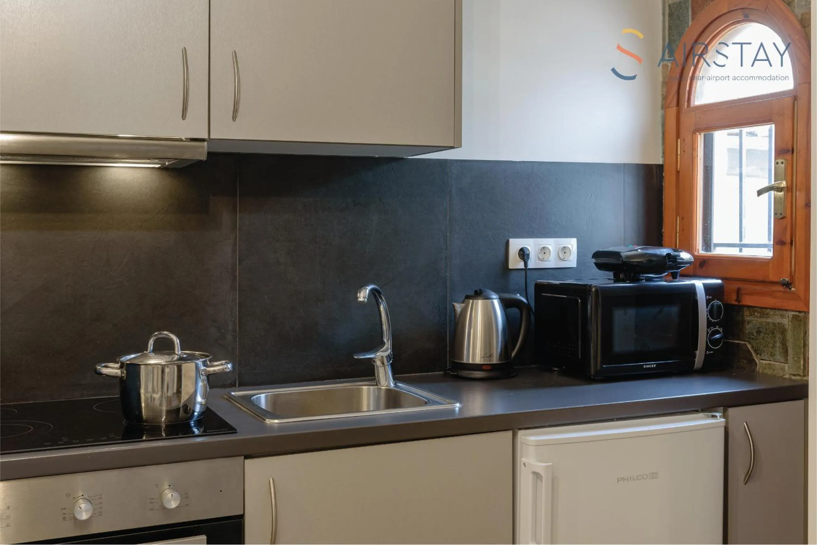 kitchen in Ryze Apartments Airport by Airstay