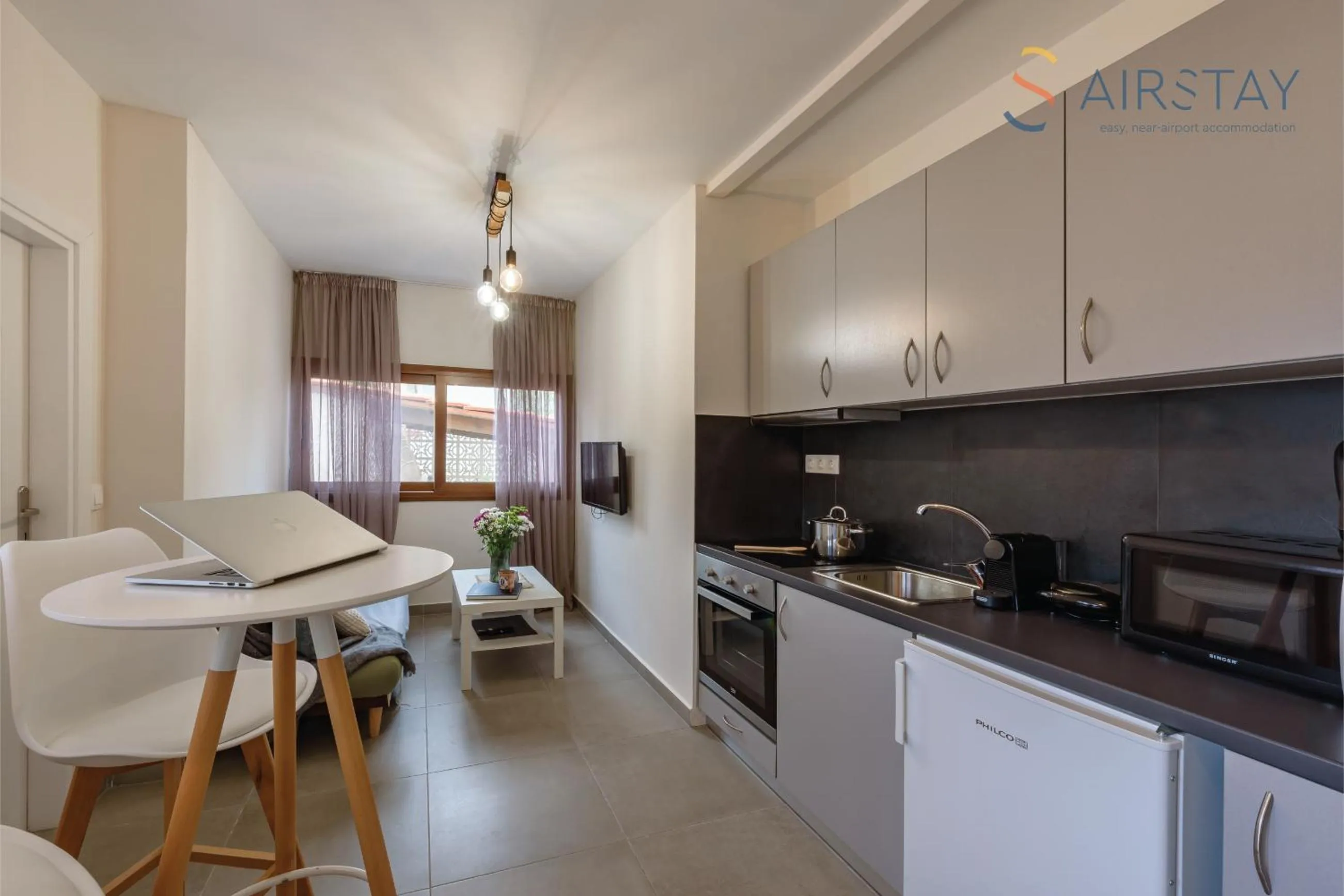 Living room in Ryze Apartments Airport by Airstay