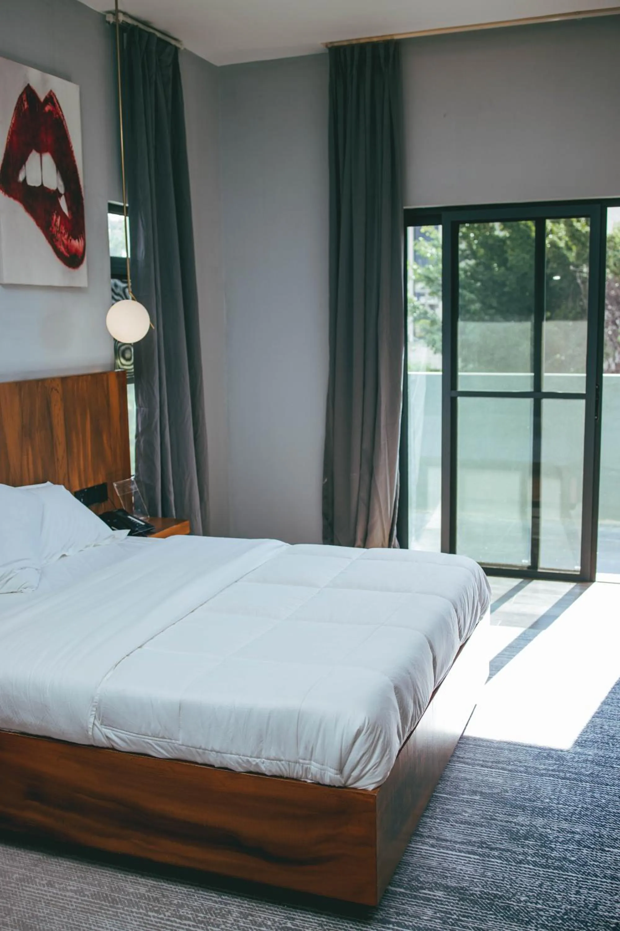 Bed in Burundi Palace Boutique Hotel