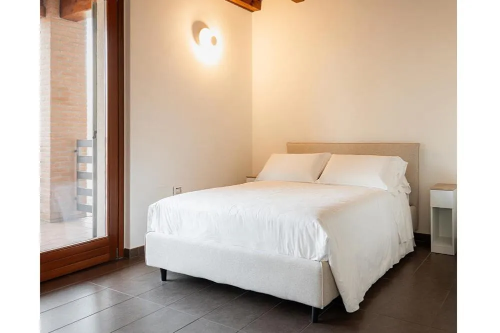 Bed in Bes Residence Bergamo Polaresco