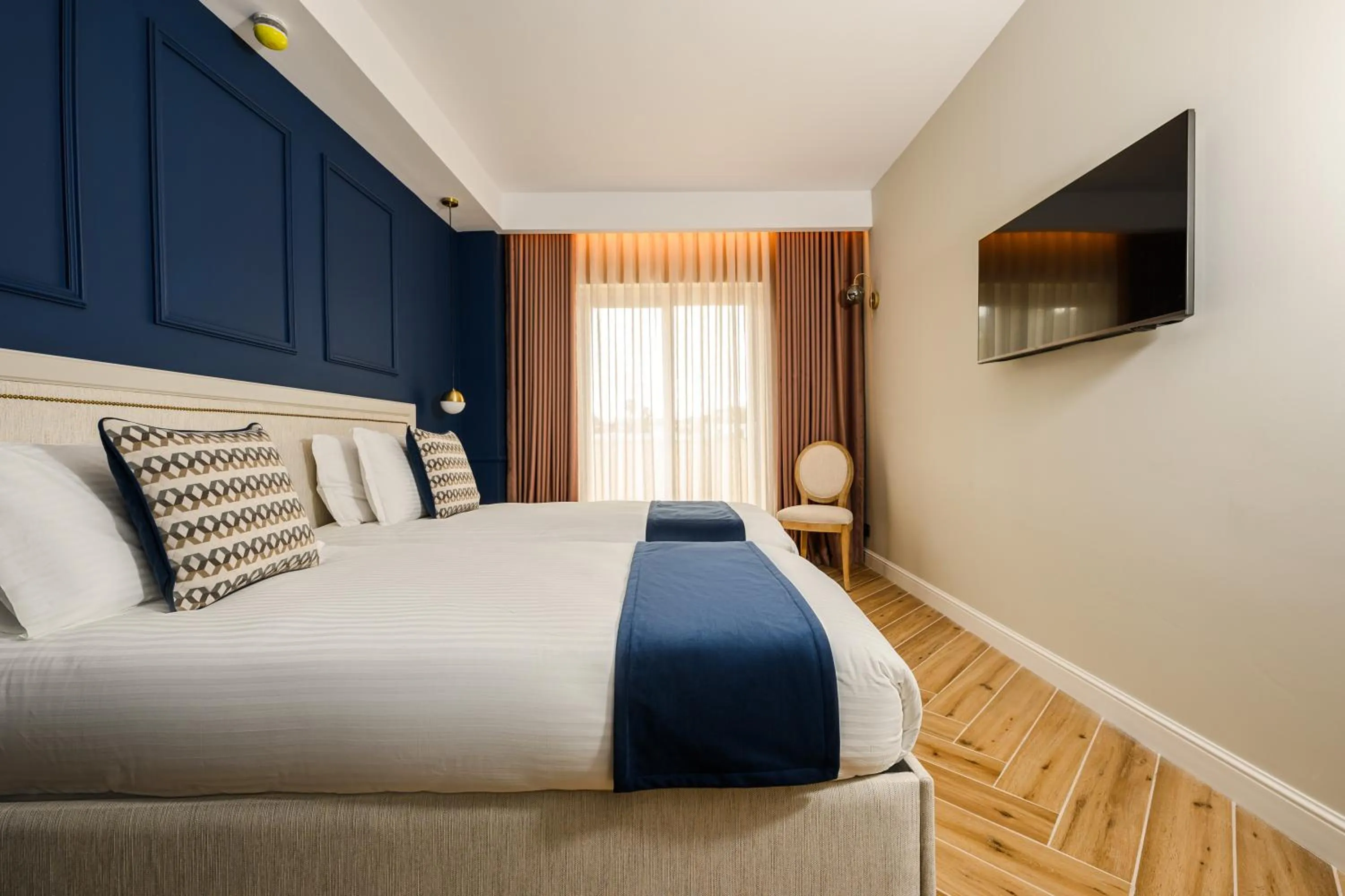 Bed in XVI Suites - Adults Only