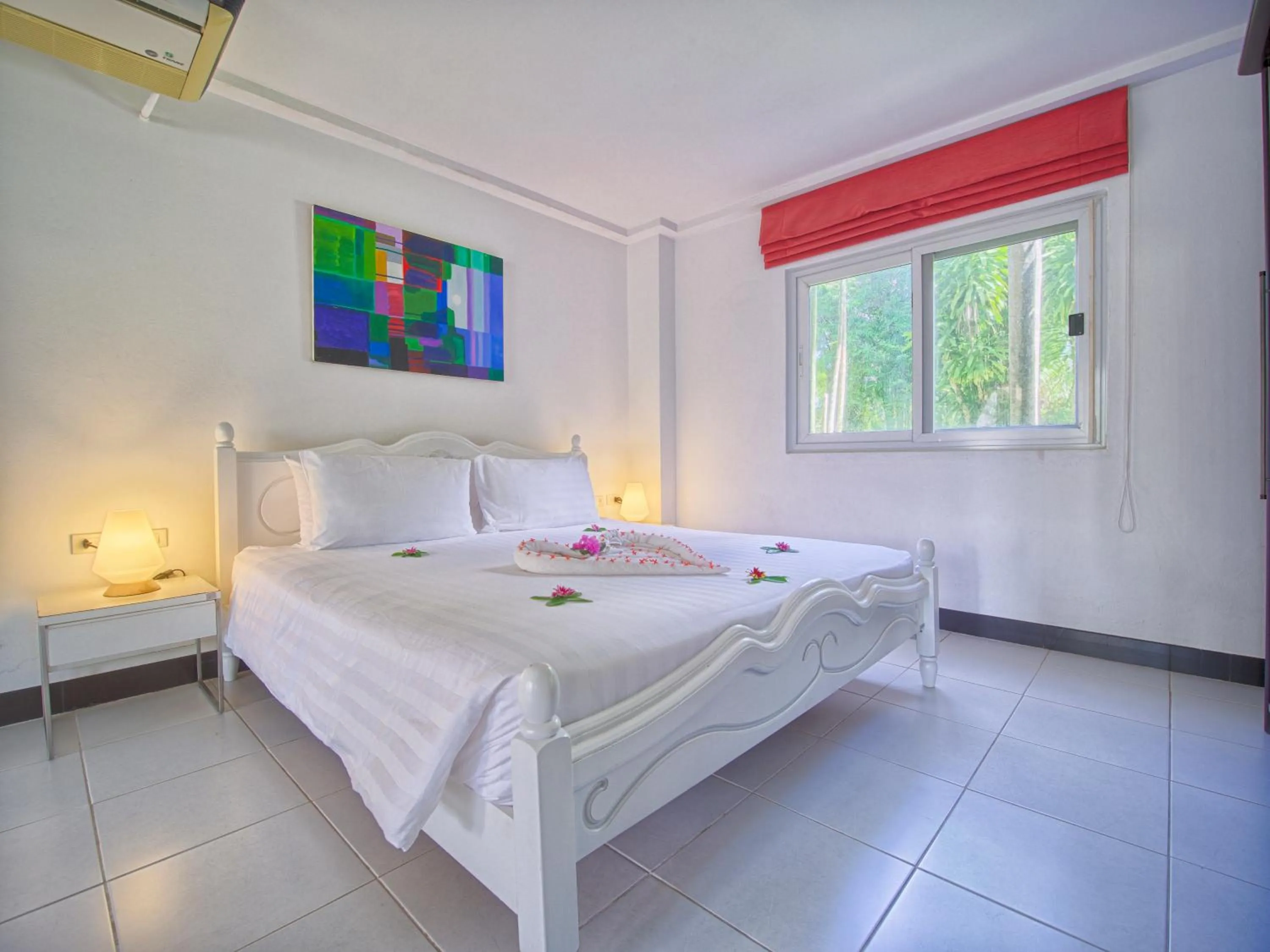 Bed in Serenity Lakeside Resort