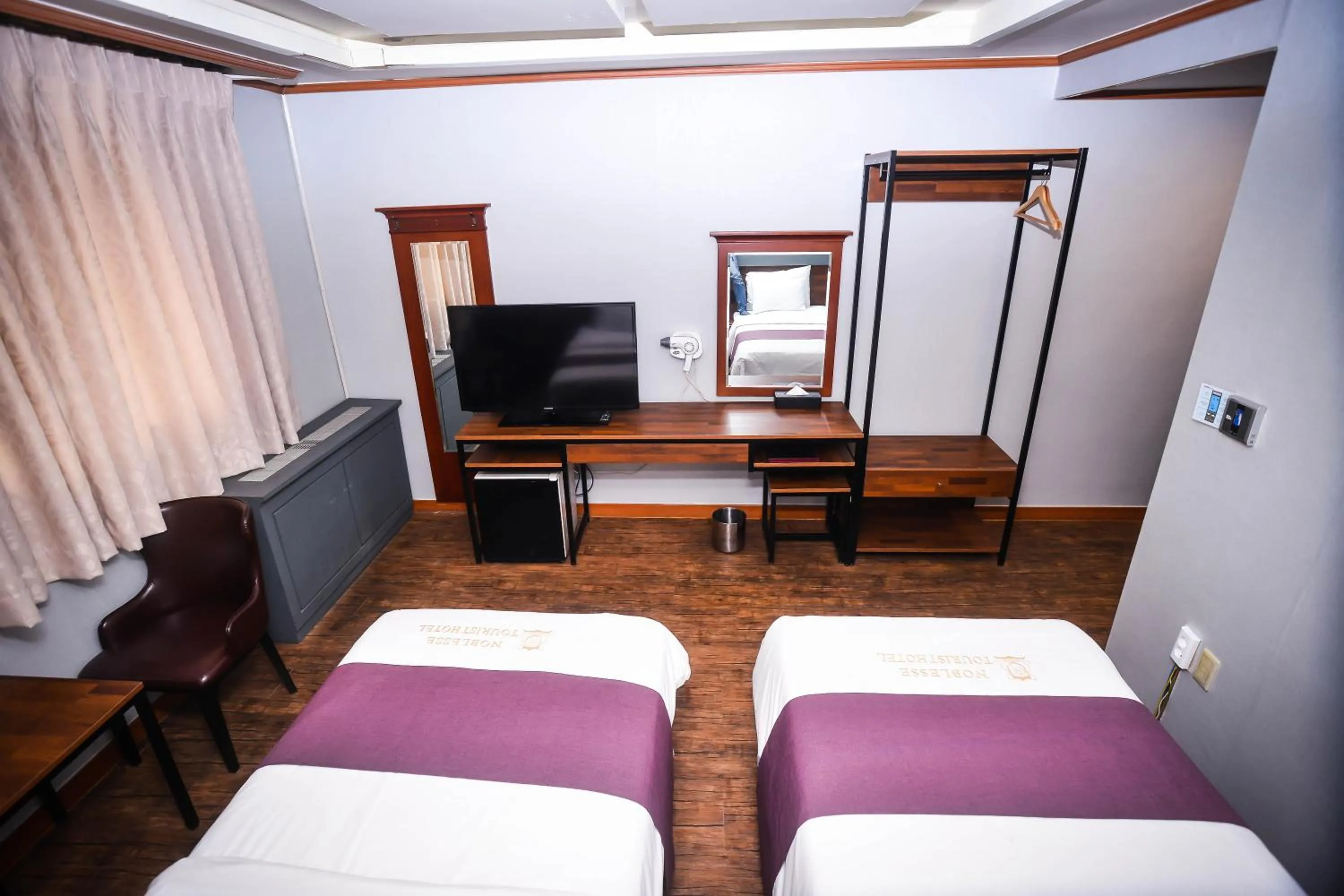 Bed in Hotel Noblesse