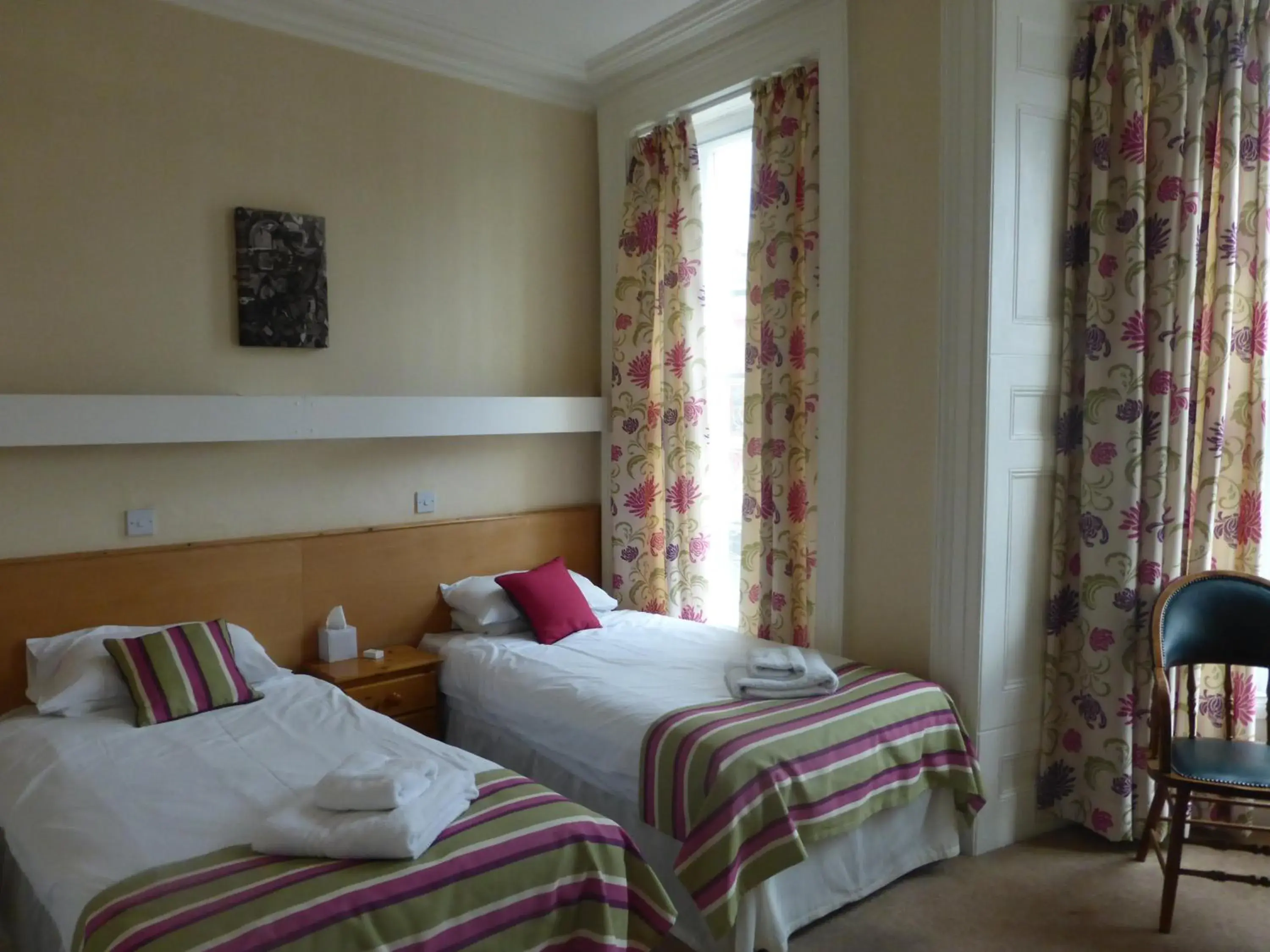 Bed in Harry's Hotel & Restaurant Bed in Harry's Hotel & Restaurant